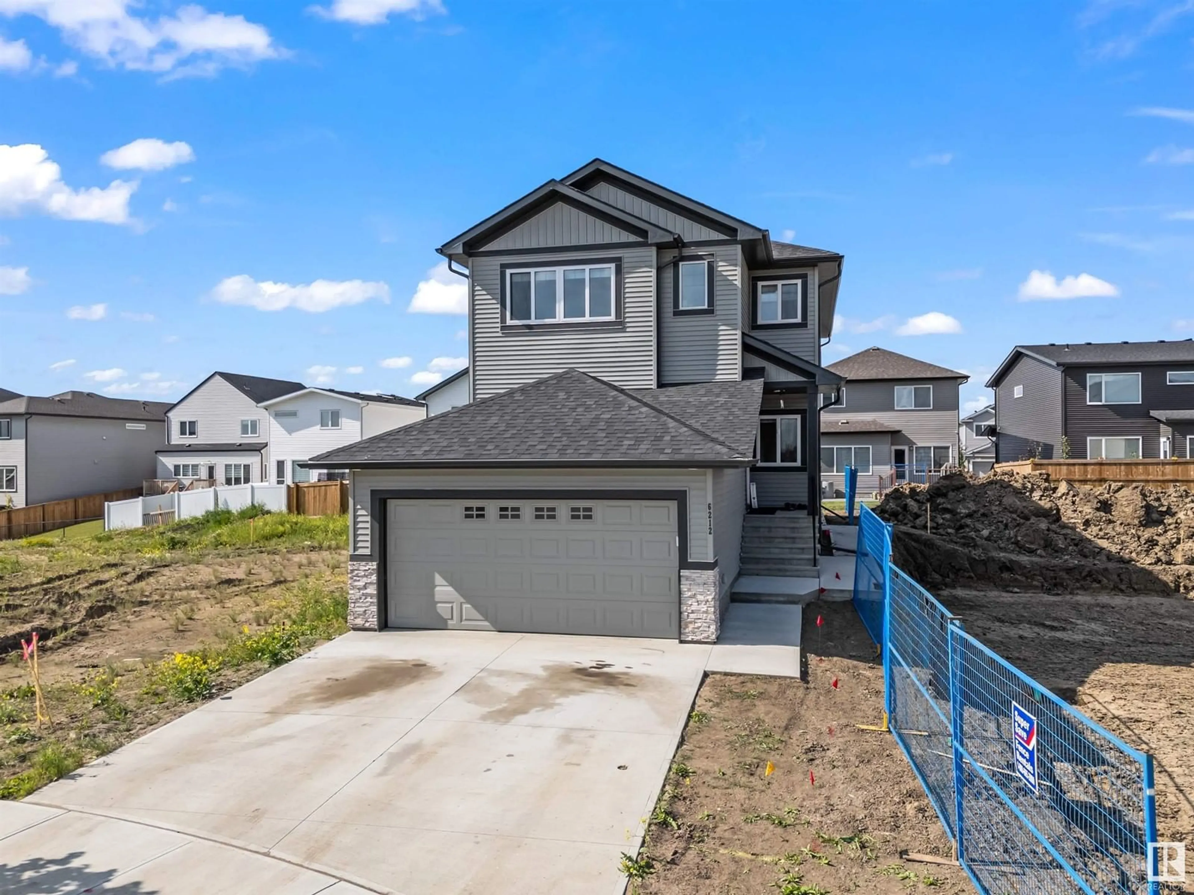 Frontside or backside of a home for 6212 46 ave, Beaumont Alberta T4X2Z2