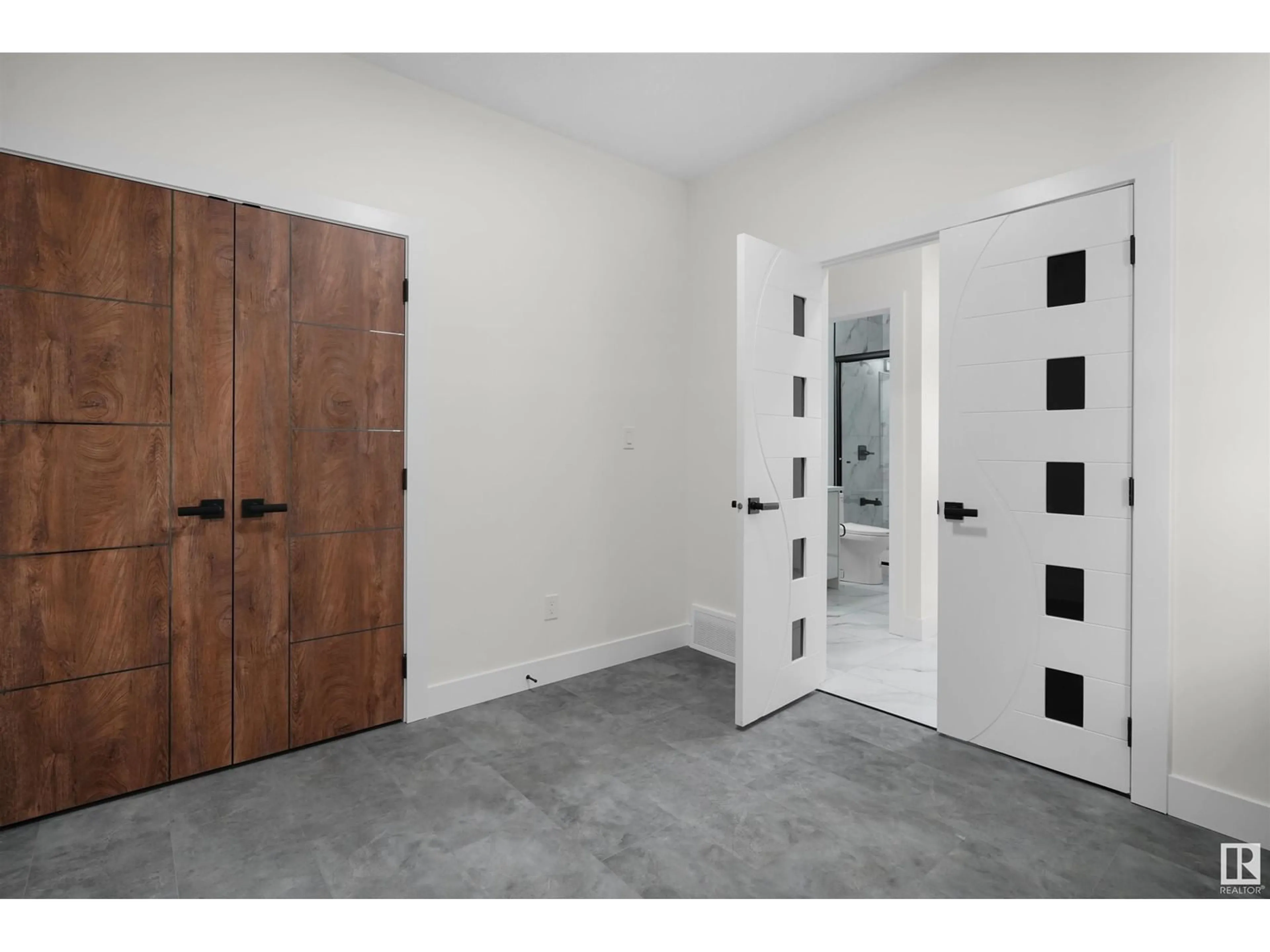 Indoor entryway, cement floor for 9308 183 AV NW, Edmonton Alberta T5Z0V1