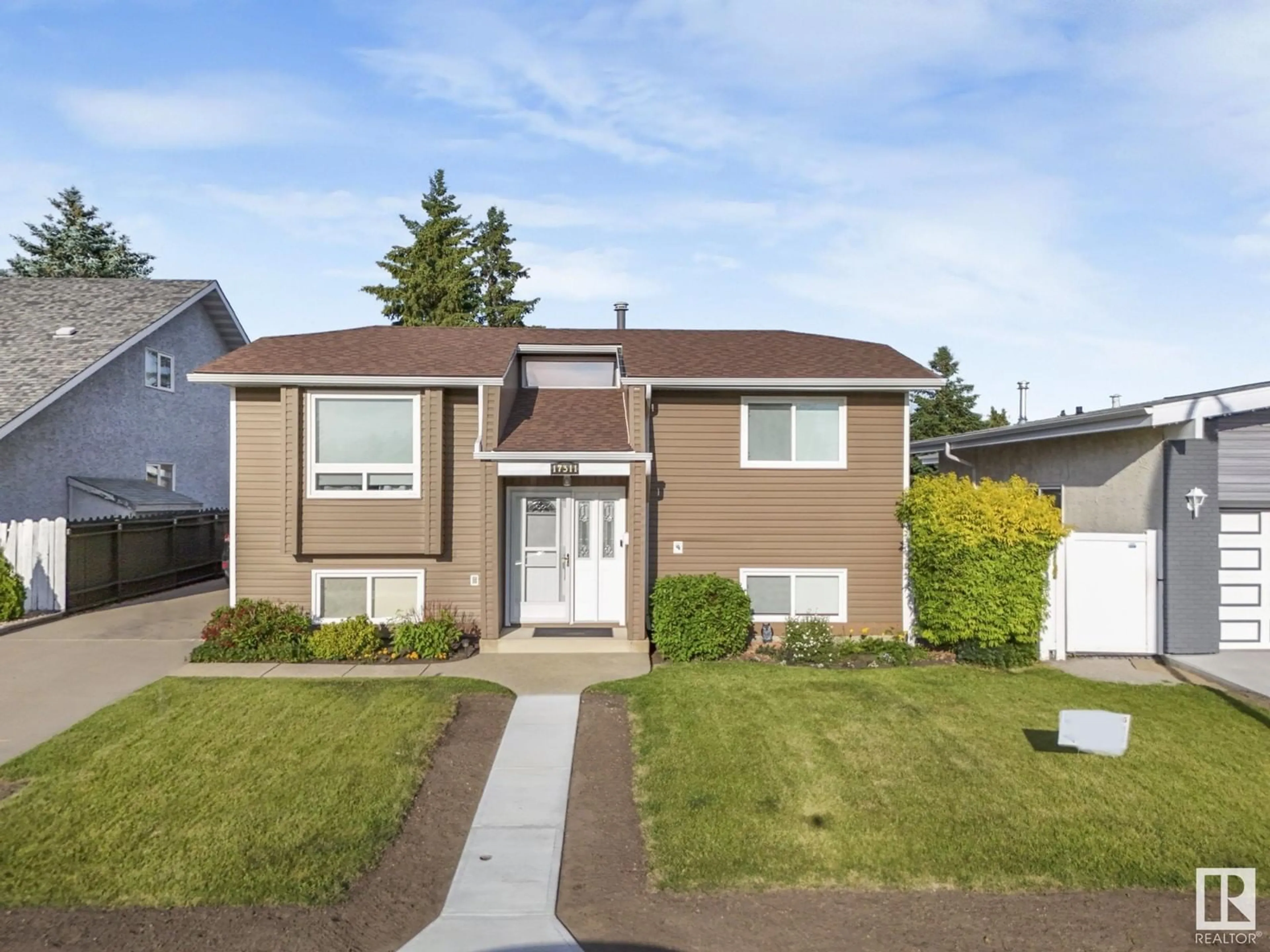 Frontside or backside of a home for 17311 102 ST NW, Edmonton Alberta T5X3X5