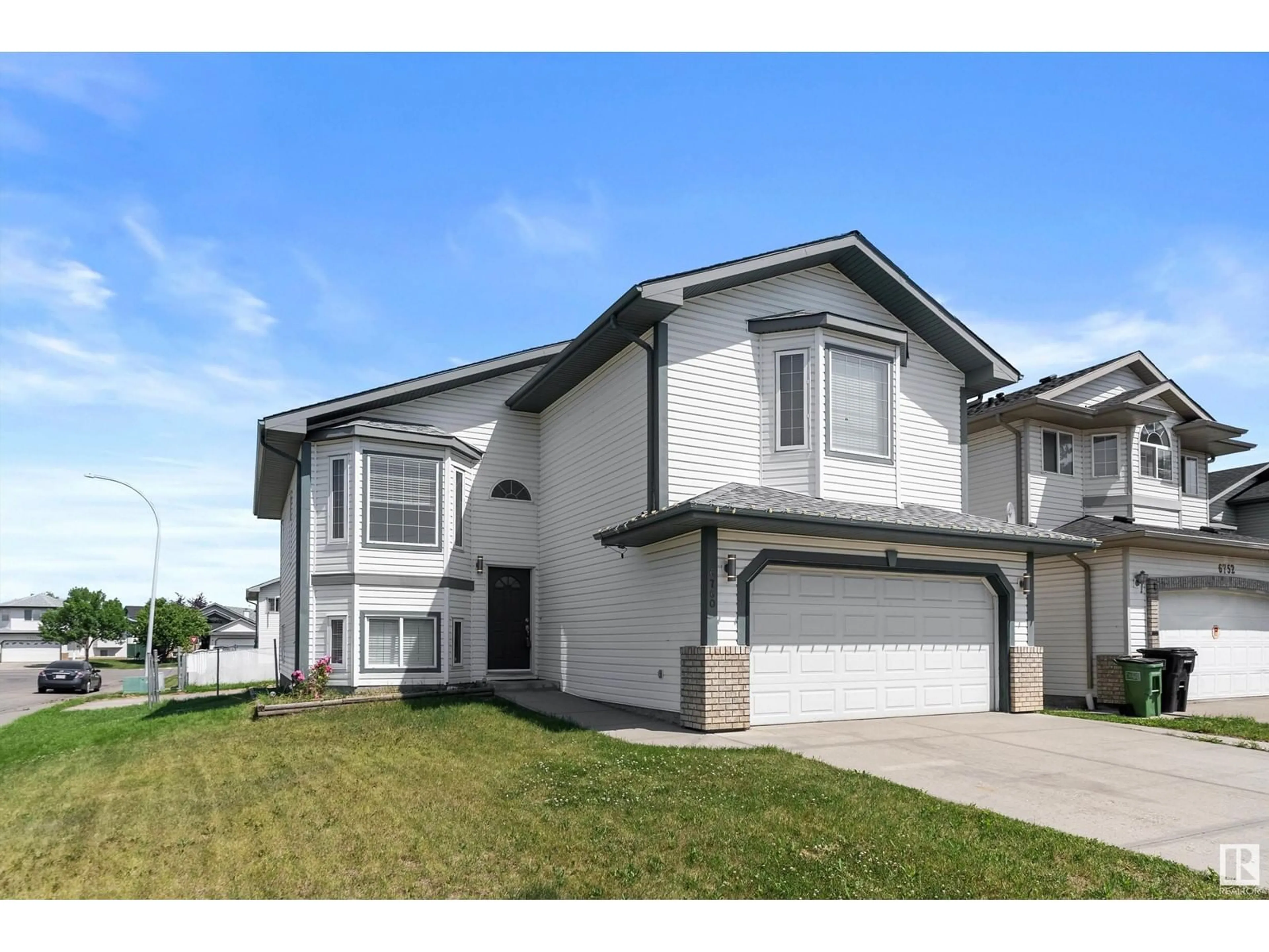 Frontside or backside of a home for 6760 164 AV NW, Edmonton Alberta T5Z3M6