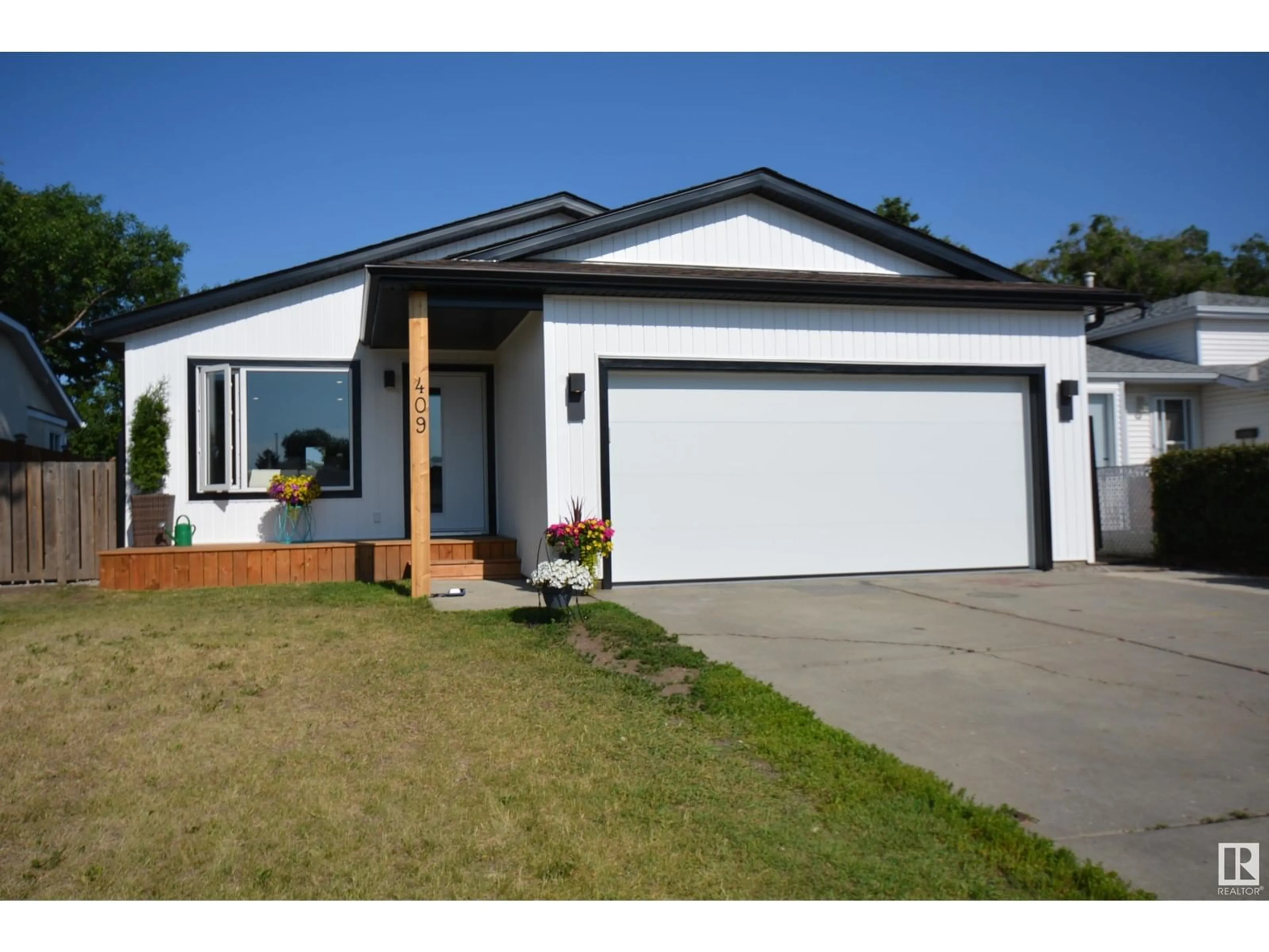 Frontside or backside of a home for 409 ST. ANDREWS CR, Stony Plain Alberta T7Z1K5
