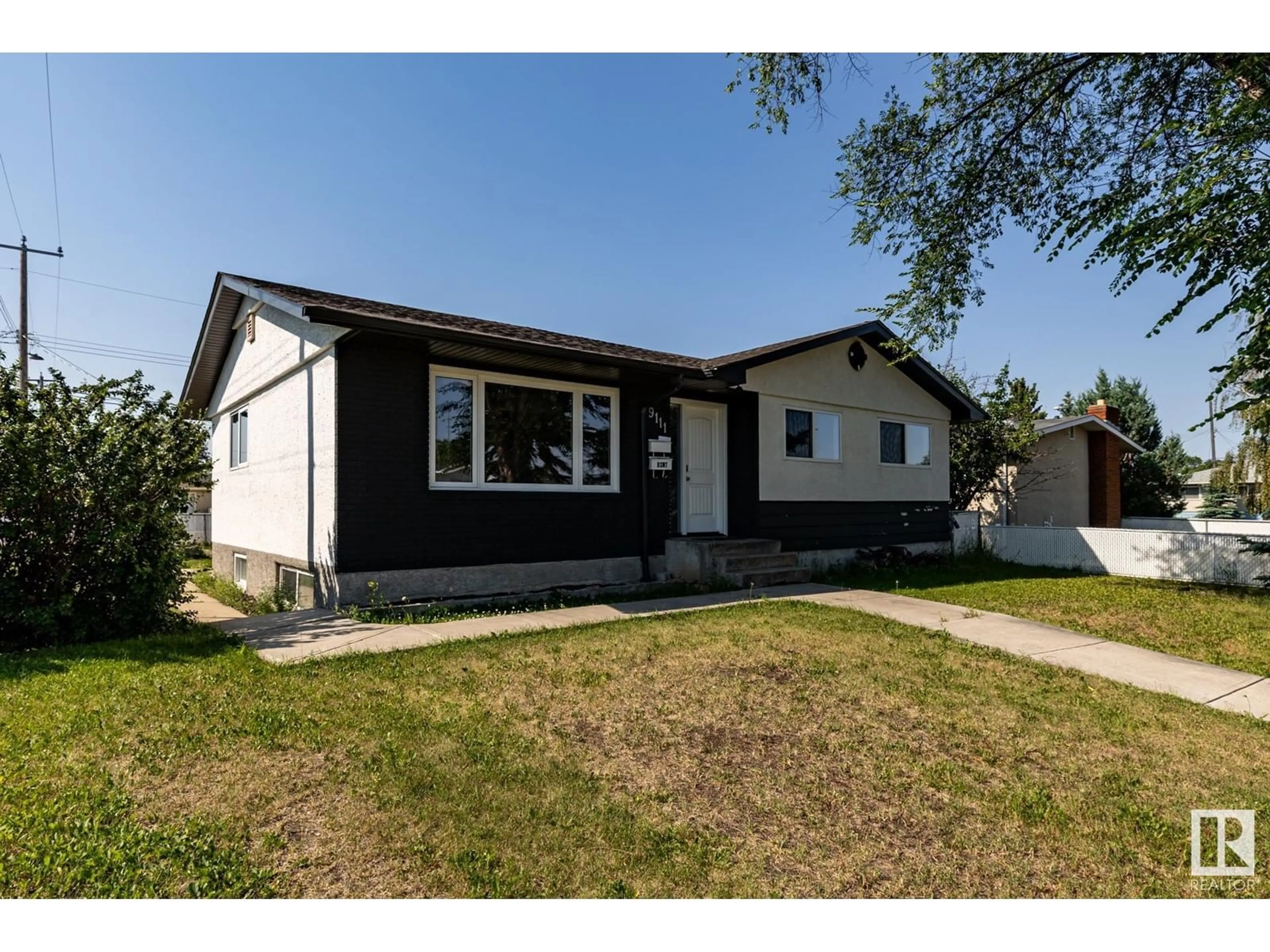 Frontside or backside of a home for 9111 136 AV NW, Edmonton Alberta T5E1V8