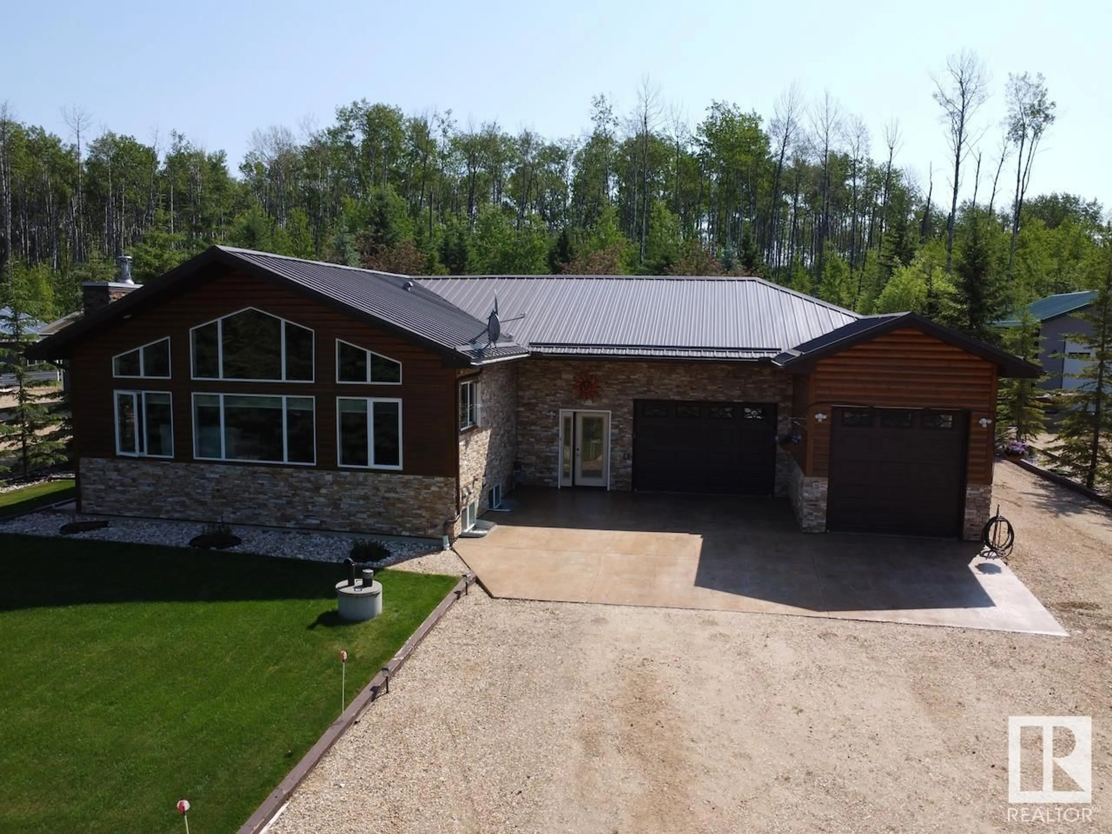 A pic from outside/outdoor area/front of a property/back of a property/a pic from drone, building for 37 Broken Paddle DR, Rural Lesser Slave River M.D. Alberta T0G2B0