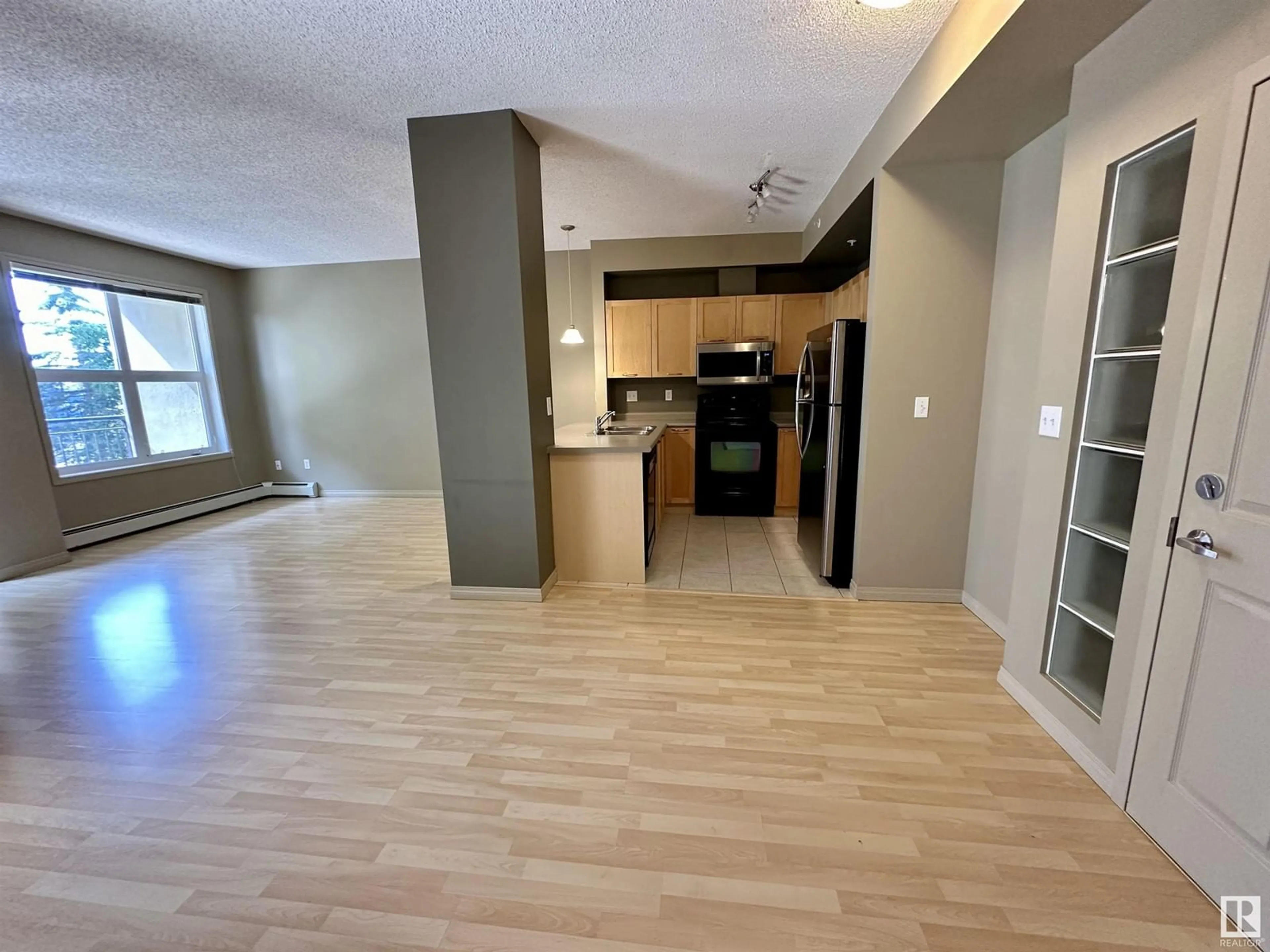 A pic of a room for #1-212 4245 139 AV NW NW, Edmonton Alberta T5Y3E8