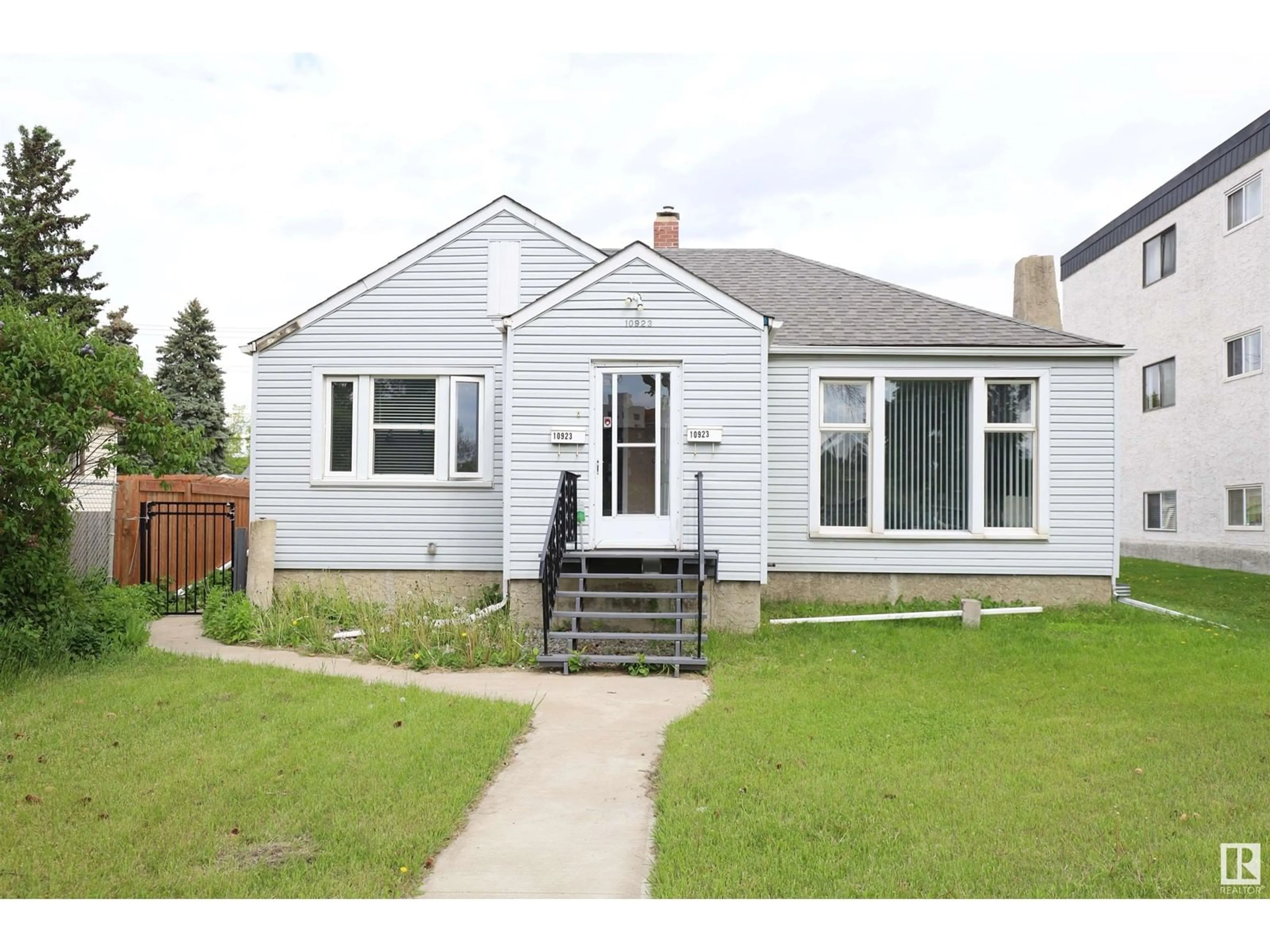 Frontside or backside of a home for 10923 109 ST NW, Edmonton Alberta T5H3C2
