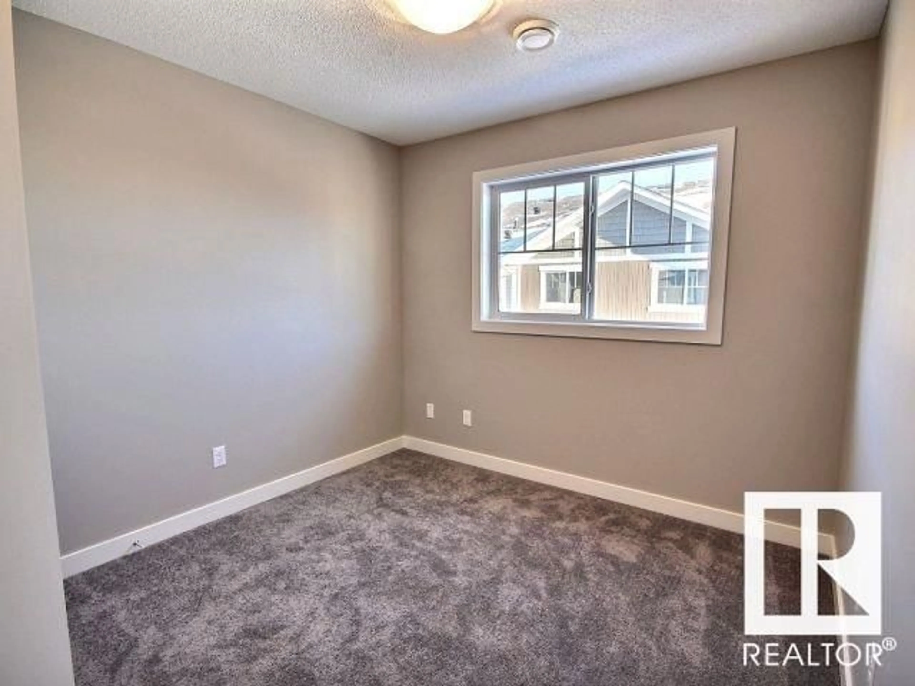 A pic of a room, carpet floors for #105 17832 78 ST NW, Edmonton Alberta T5Z0P7