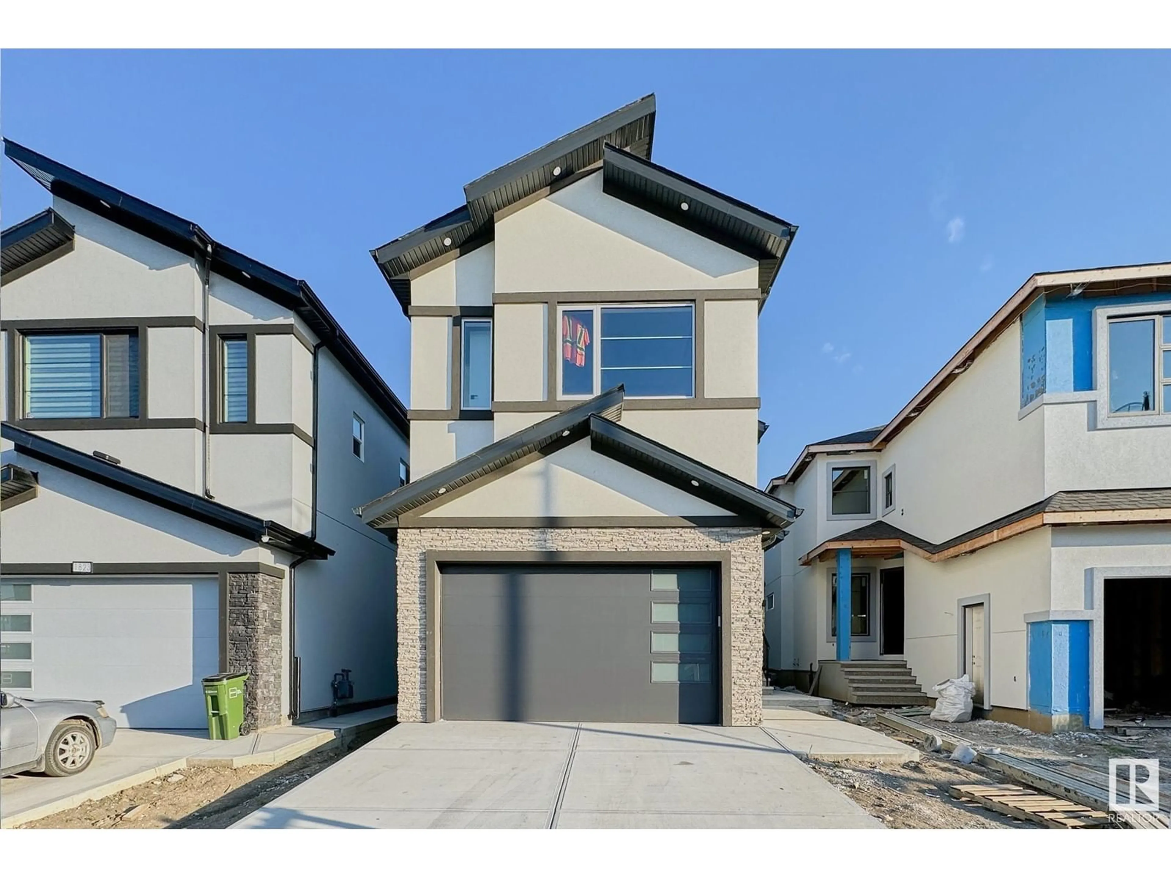 Frontside or backside of a home for 1827 17 AV NW, Edmonton Alberta T6T1J1