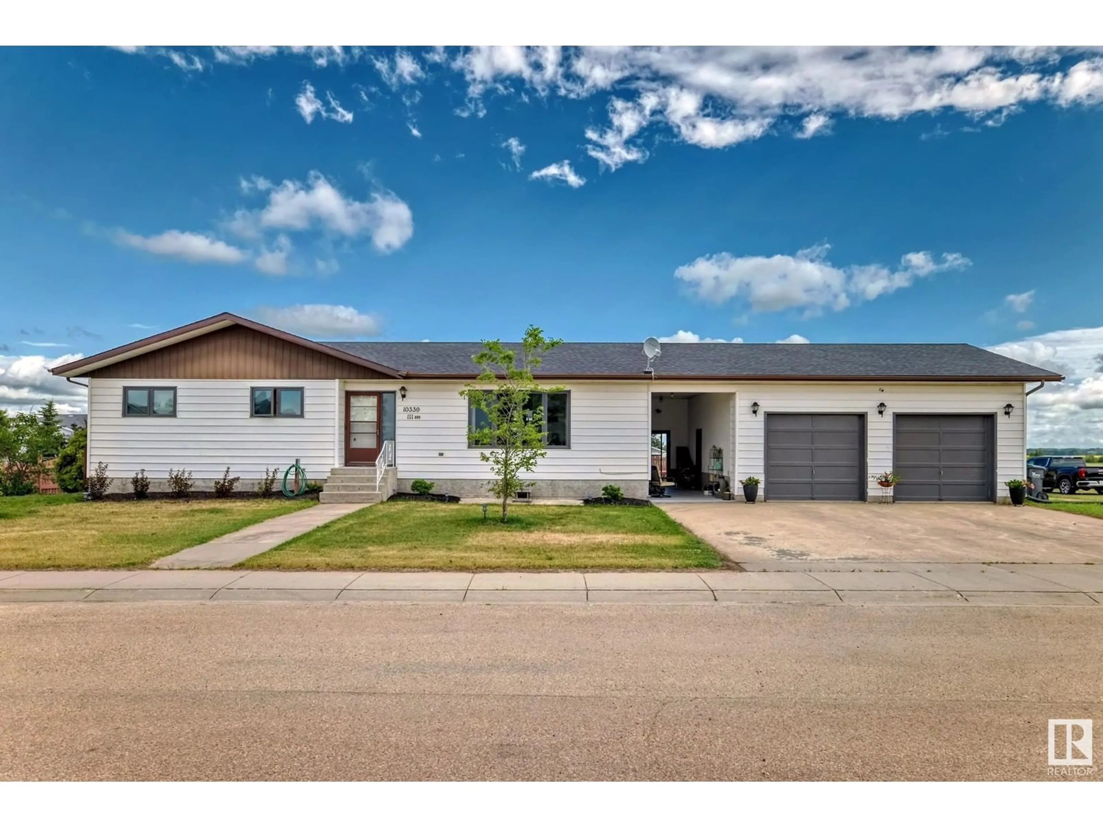 Frontside or backside of a home for 10339 111 AV, Westlock Alberta T7P1E6