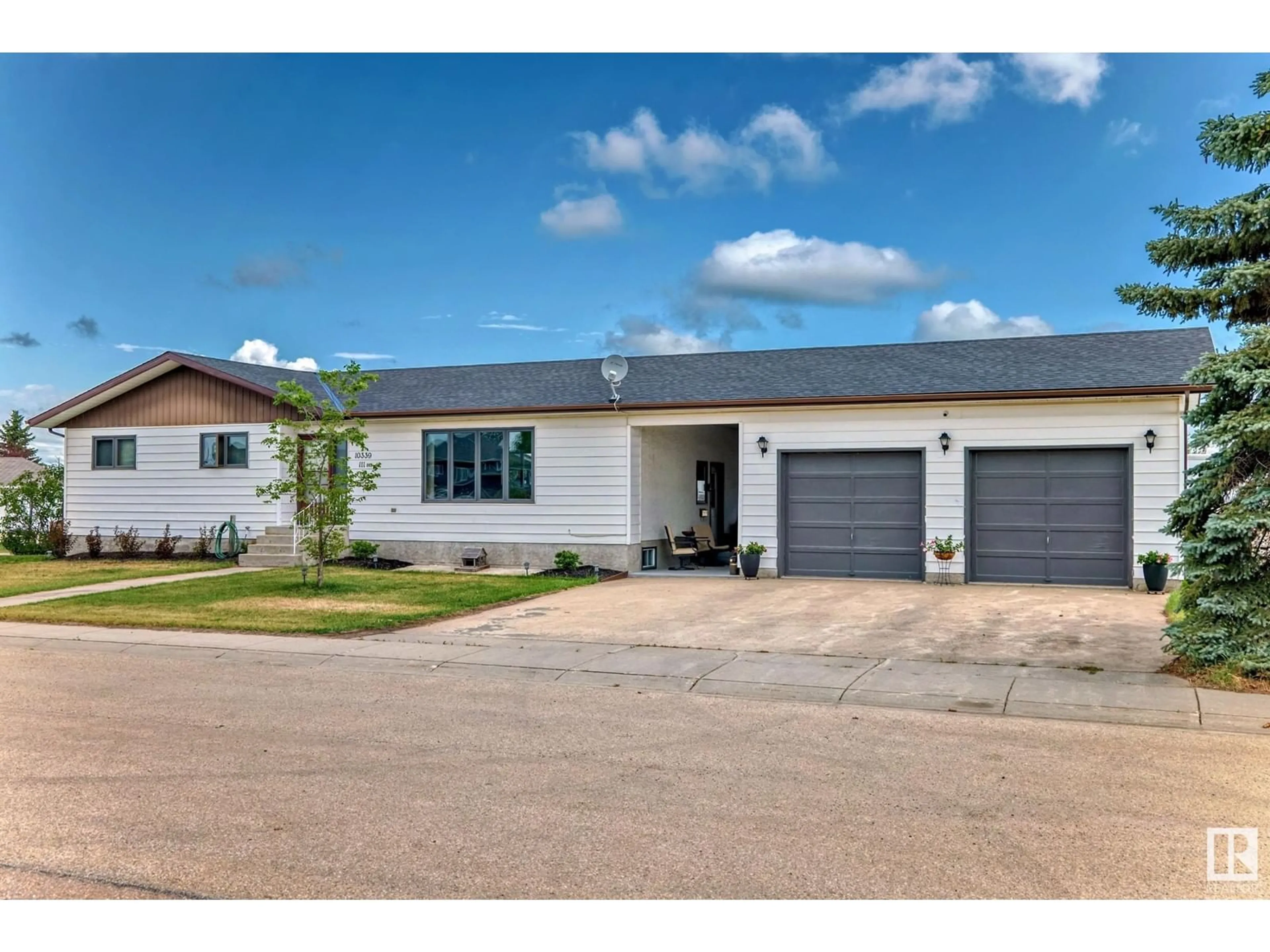 Frontside or backside of a home for 10339 111 AV, Westlock Alberta T7P1E6