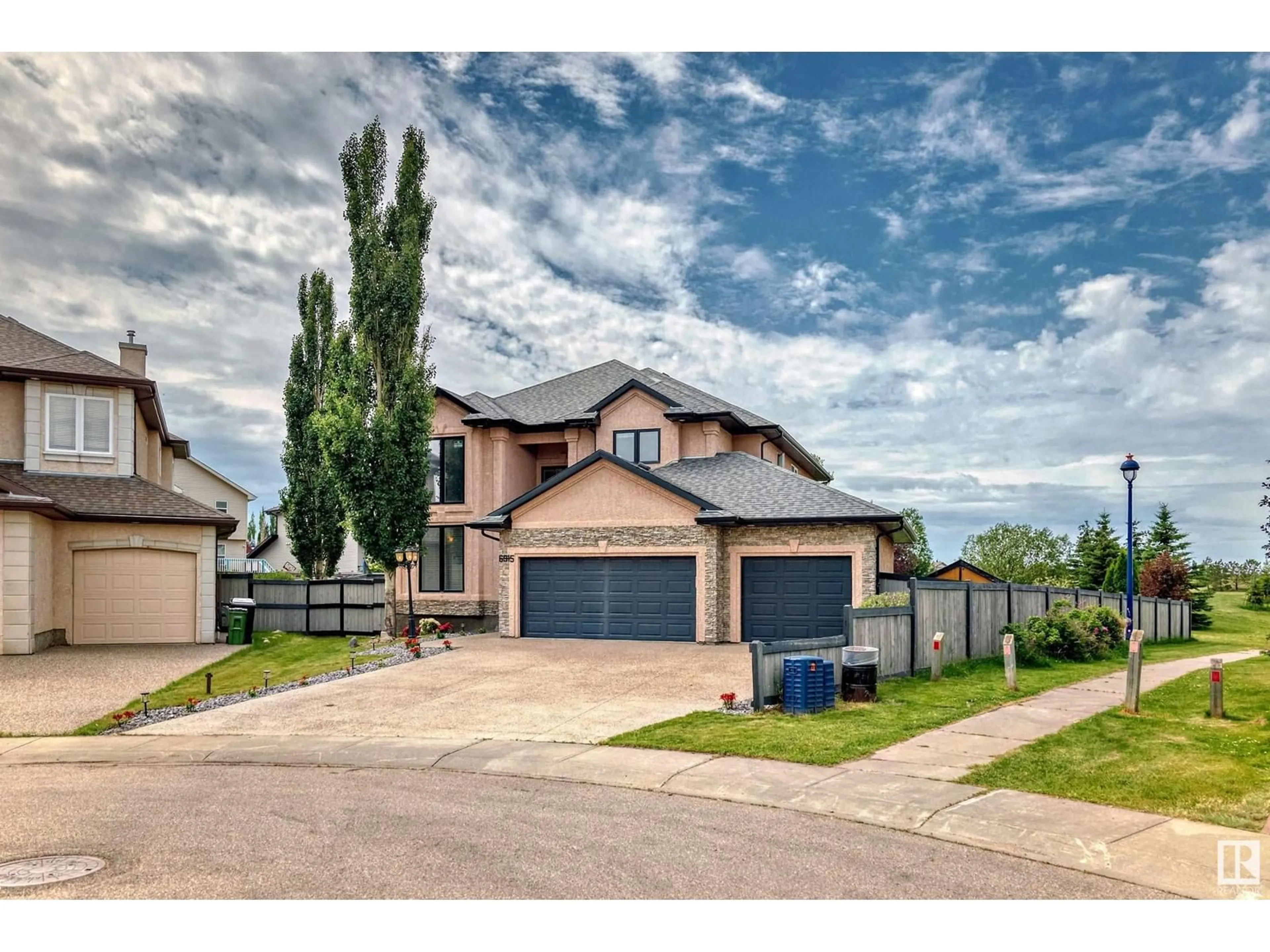 Frontside or backside of a home for 6915 18 AV SW, Edmonton Alberta T6X0C9
