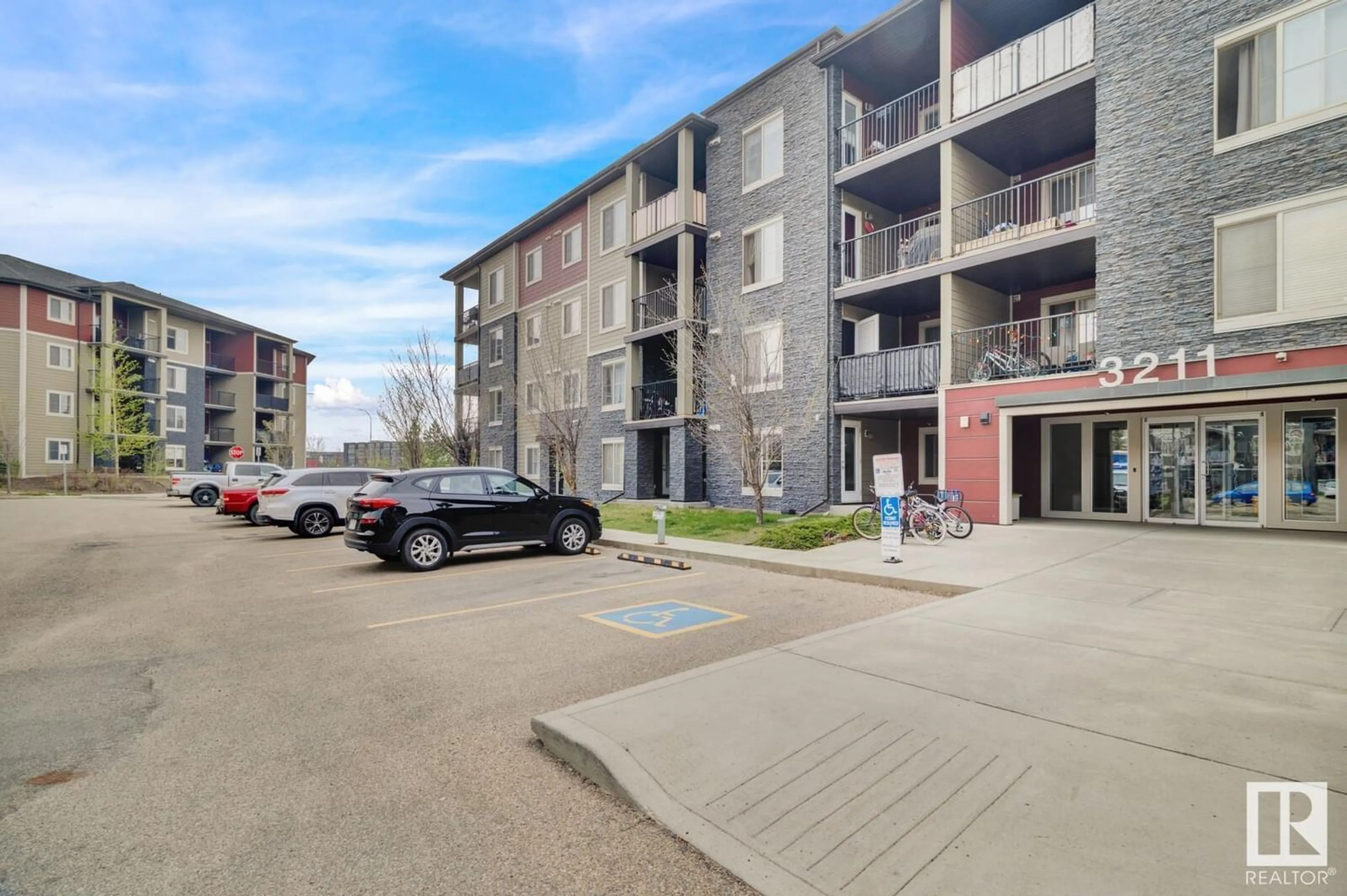 A pic from exterior of the house or condo, the street view for #106 3211 JAMES MOWATT TR SW, Edmonton Alberta T6W3L6