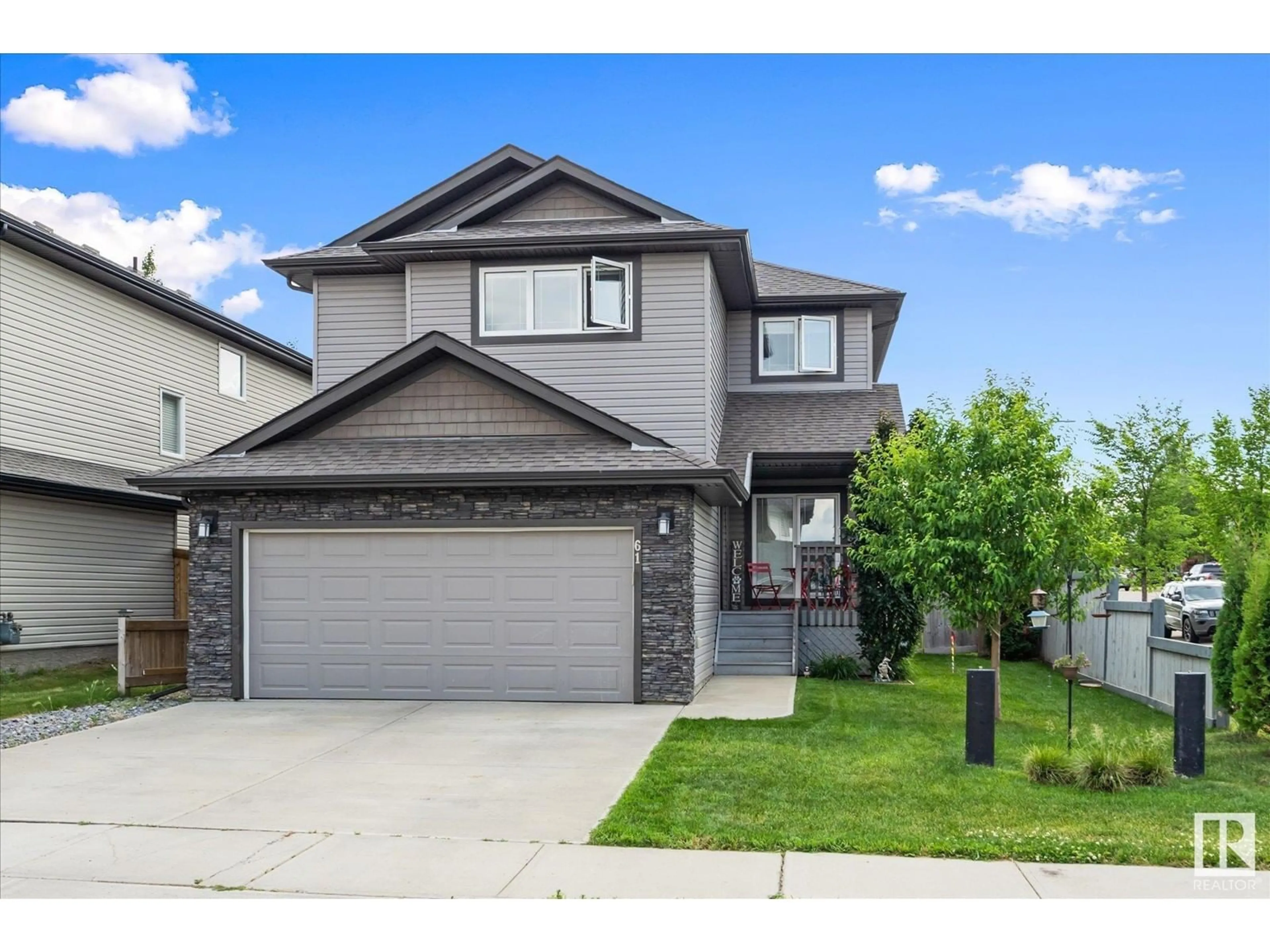 Frontside or backside of a home for 61 AVONLEA WY, Spruce Grove Alberta T7X0H8