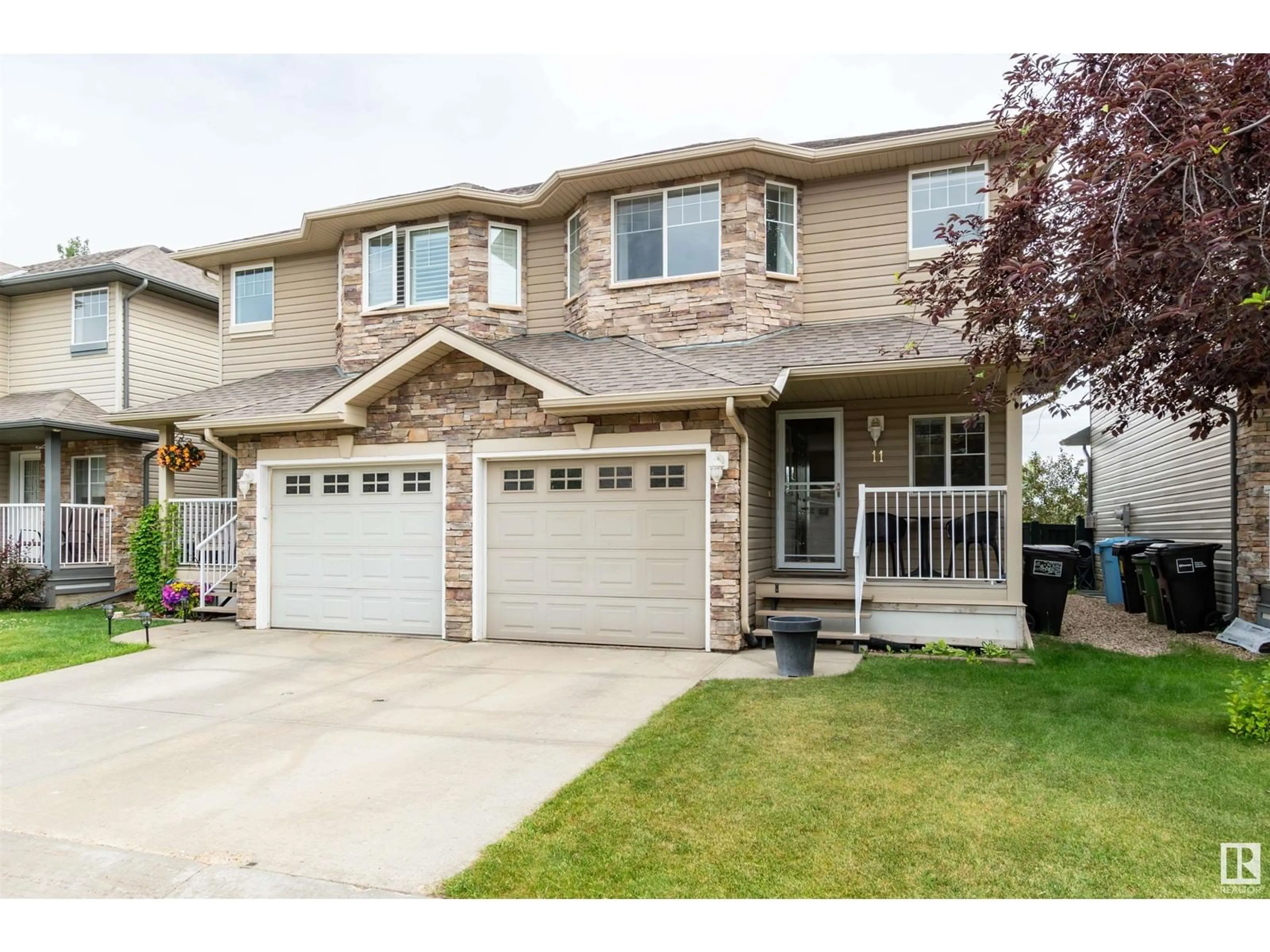 Frontside or backside of a home for #11 12104 16 AV SW, Edmonton Alberta T6W1X3