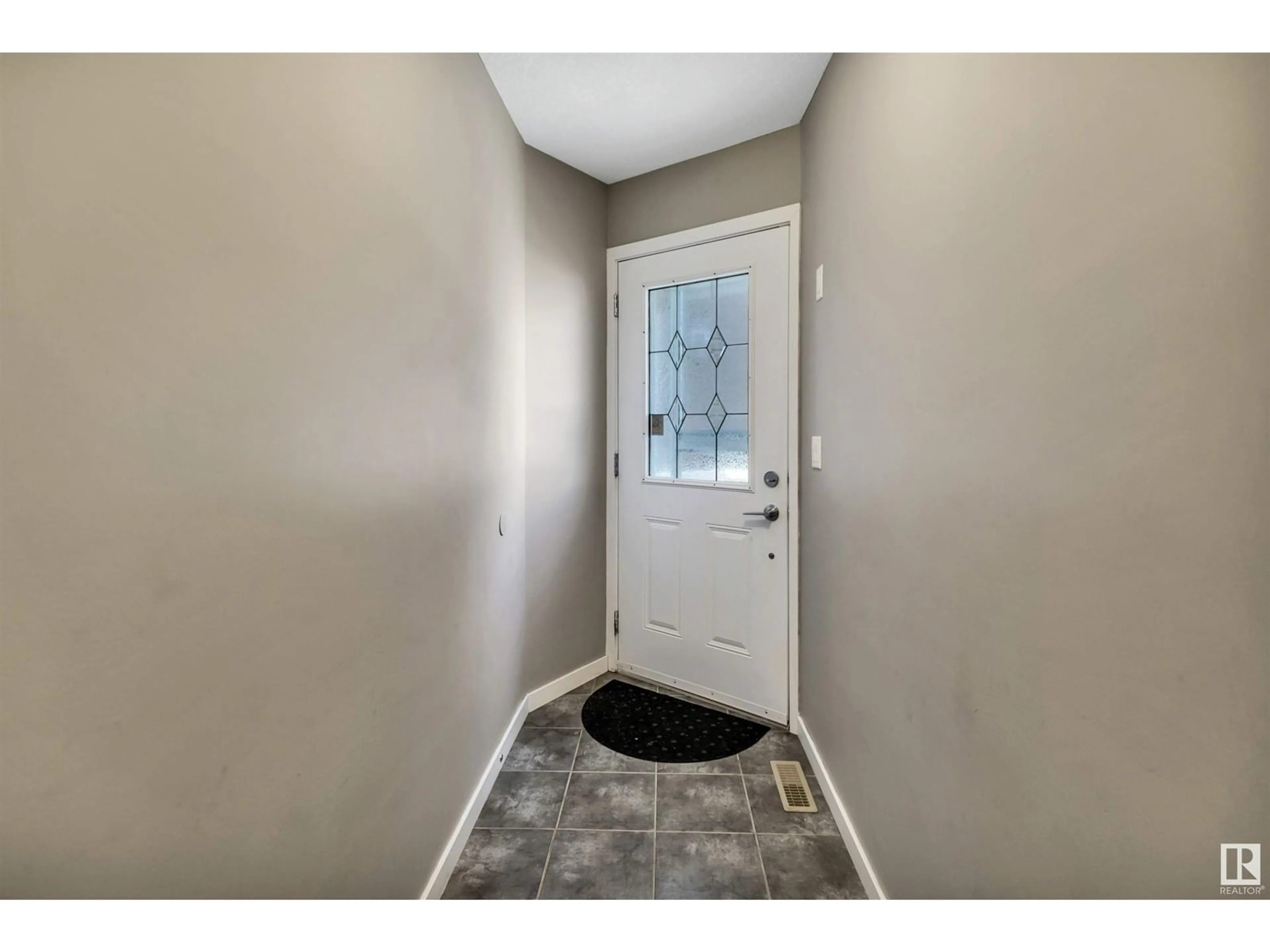 Indoor entryway, wood floors for 16735 60 ST NW, Edmonton Alberta T5T0W5