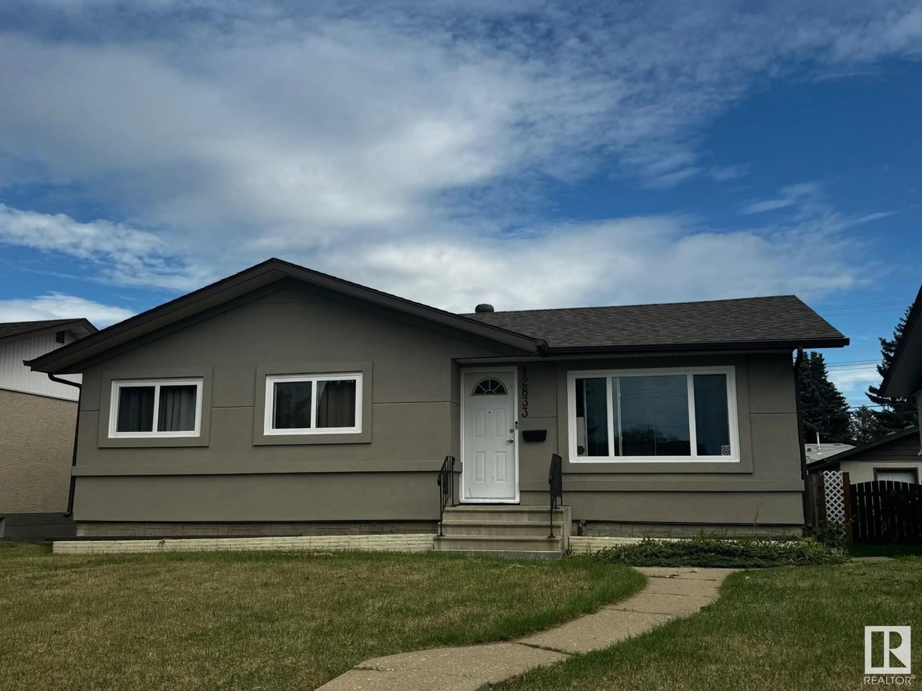 Frontside or backside of a home for 12833 90 ST NW, Edmonton Alberta T5E3L7