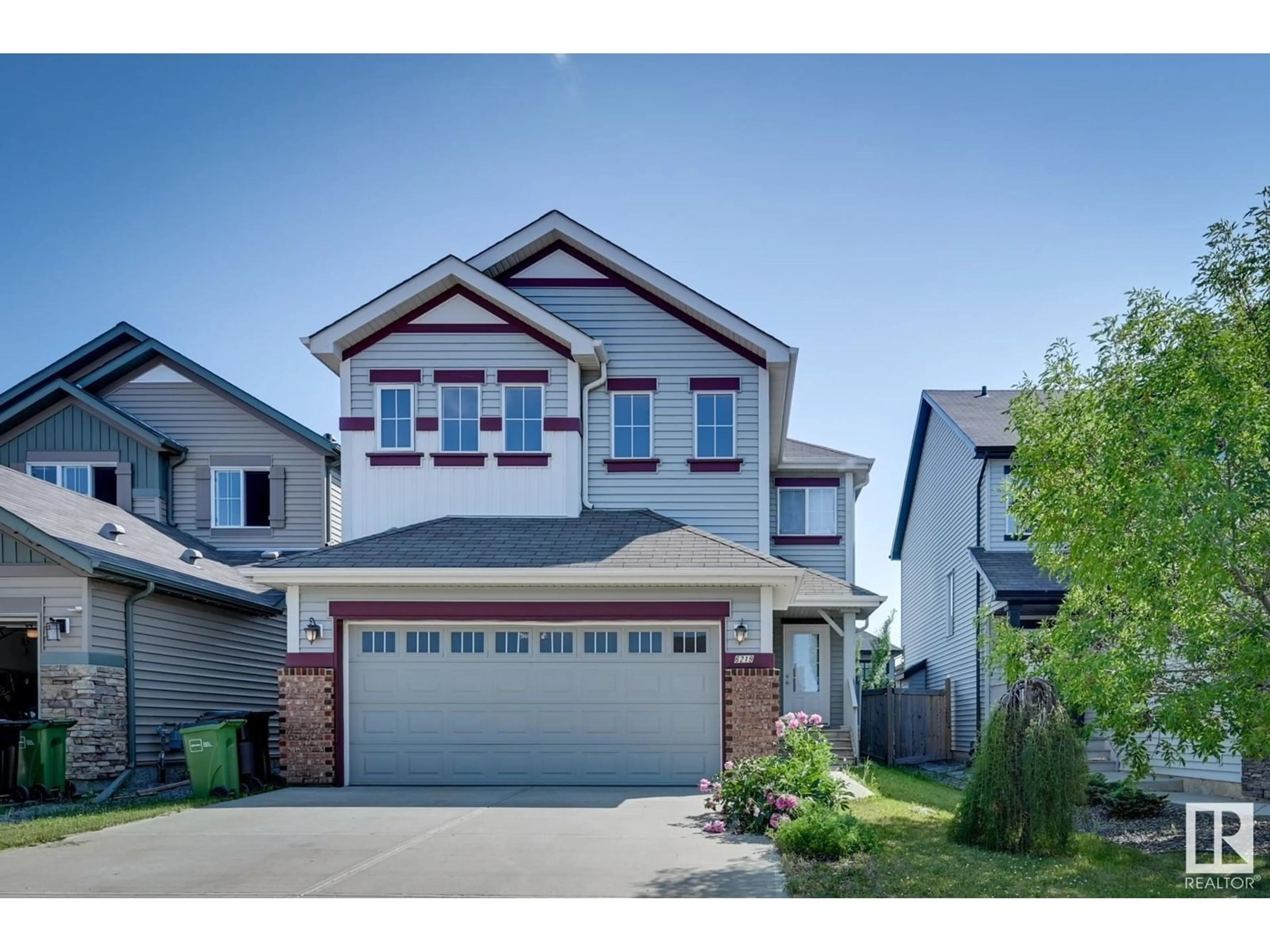 Frontside or backside of a home for 6219 18 AV SW, Edmonton Alberta T6X0S1