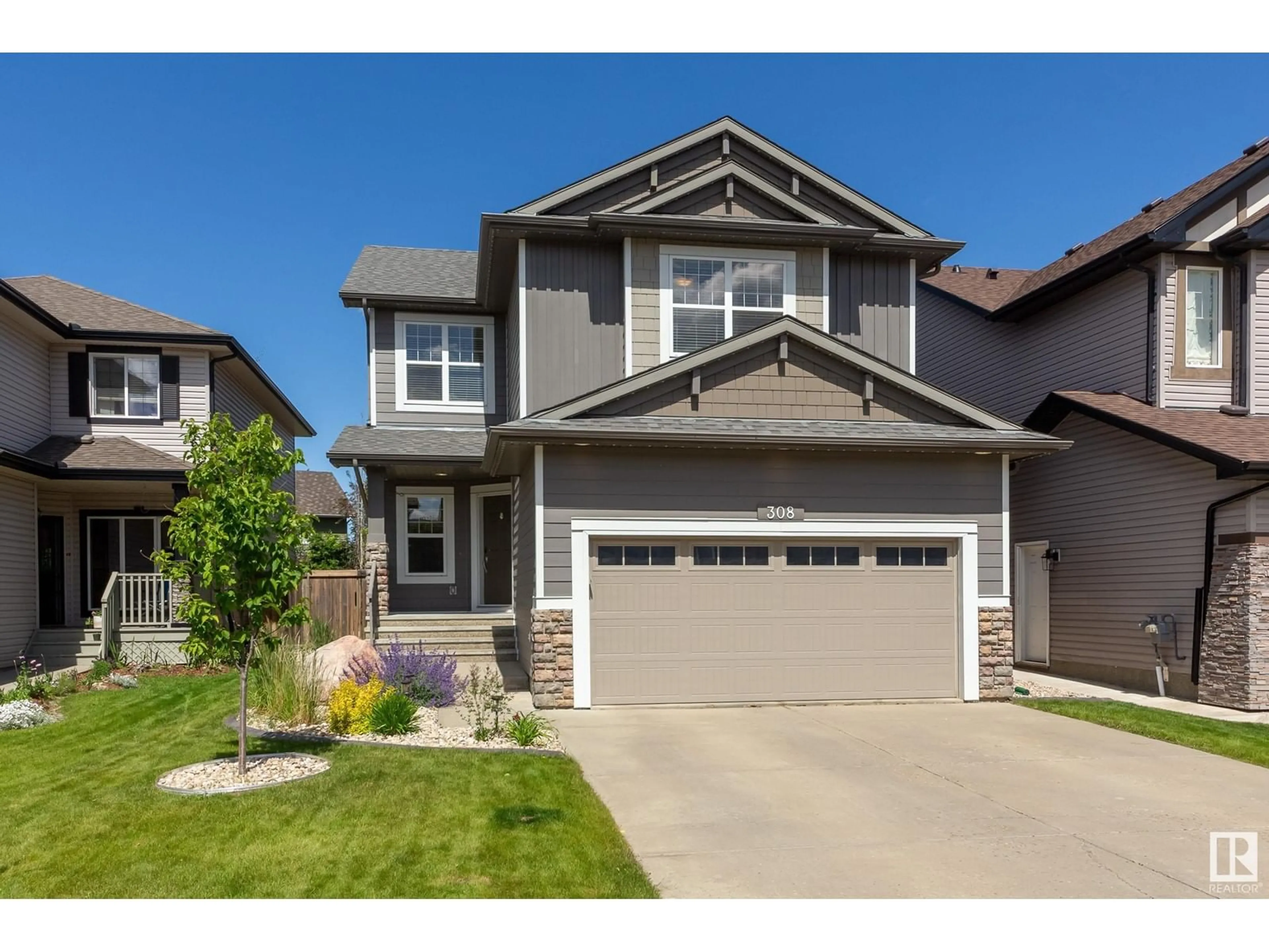 Frontside or backside of a home for 308 COWAN CR, Sherwood Park Alberta T8H0E4