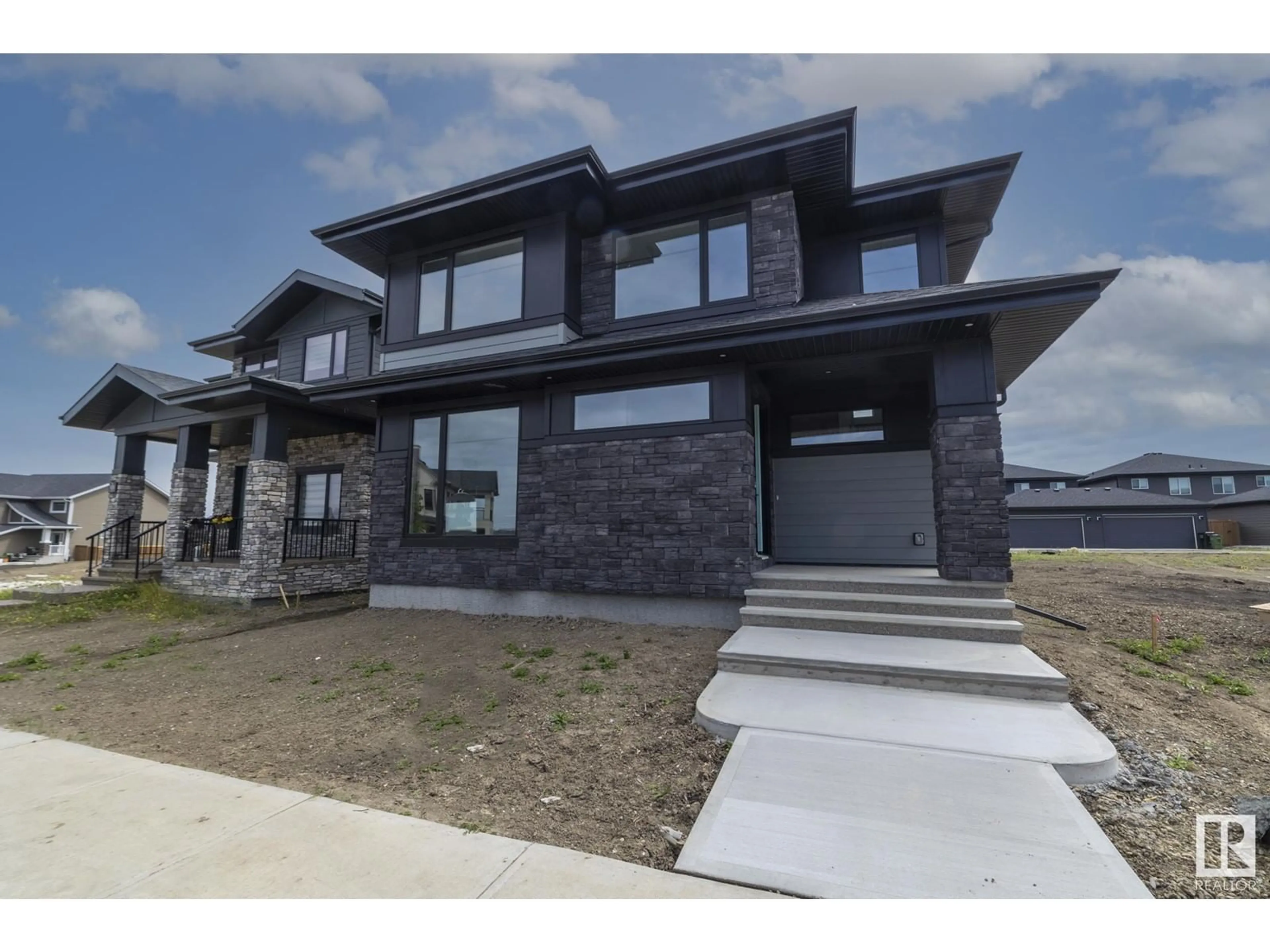 Frontside or backside of a home for 4541 Knight WD SW, Edmonton Alberta T6W4B7