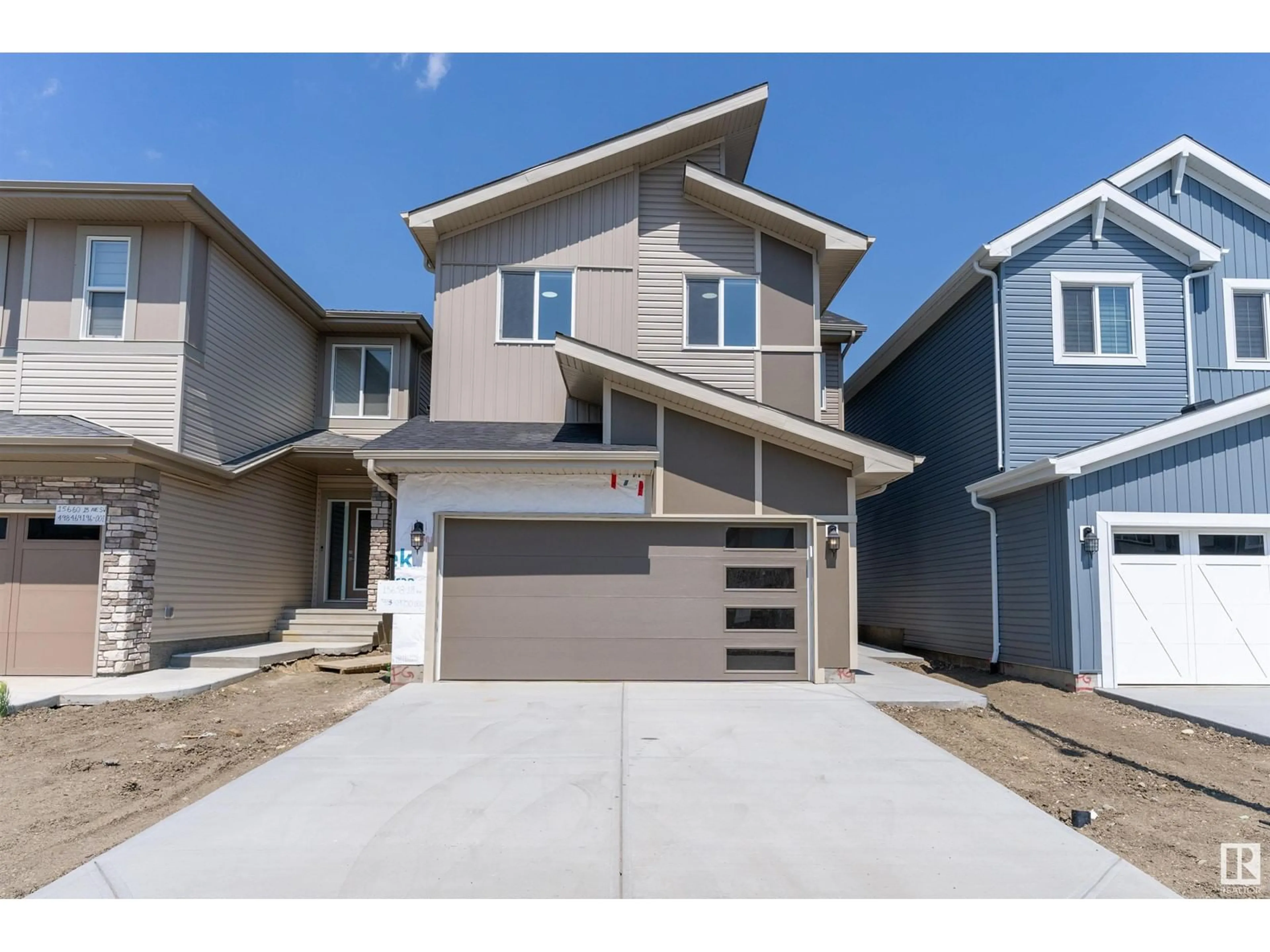 Frontside or backside of a home for 15658 18 AV SW, Edmonton Alberta T6W5C2