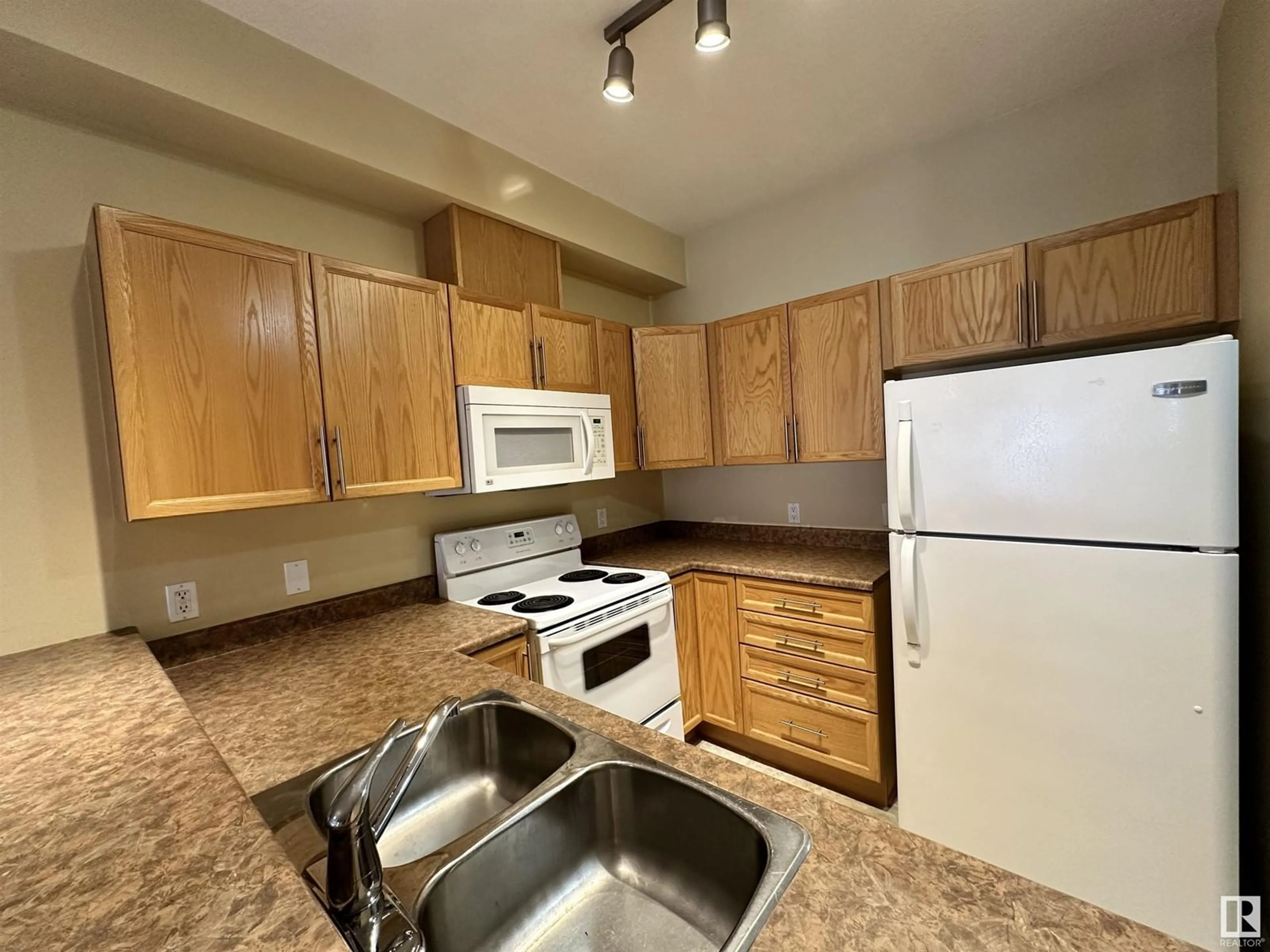 Standard kitchen for #315 4316 139 AV NW, Edmonton Alberta T5Y0L1