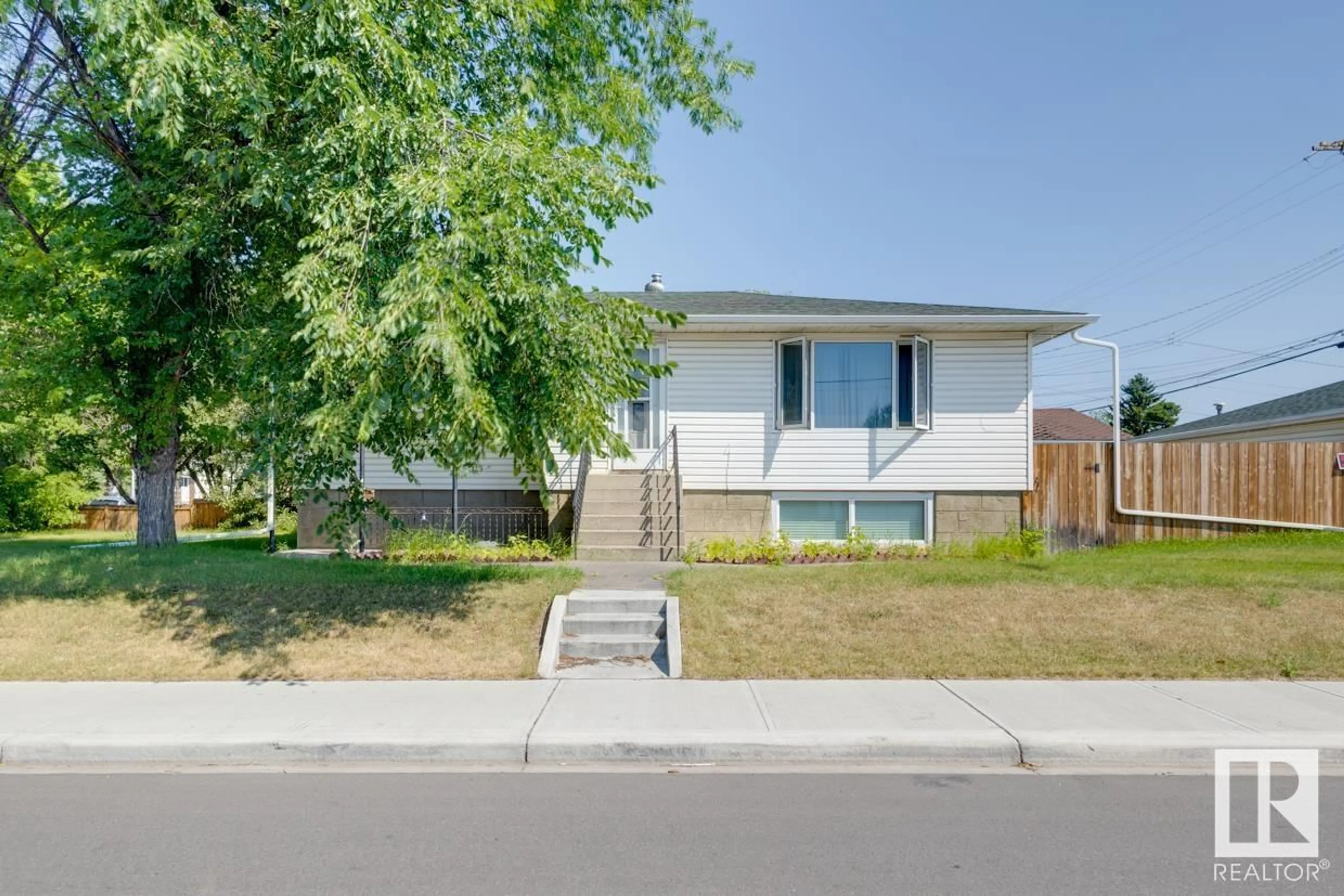 Frontside or backside of a home for 9554/9556 128 AV NW, Edmonton Alberta T5E0H7