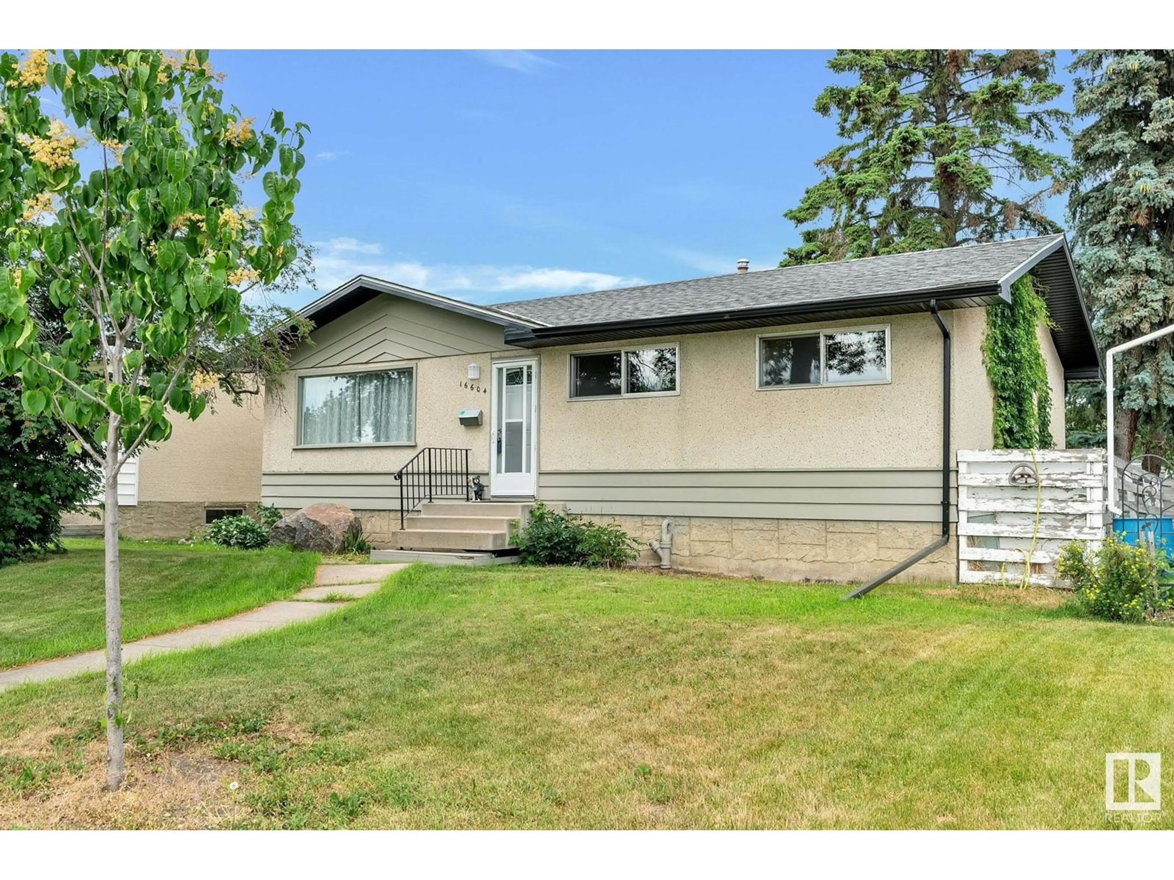 Frontside or backside of a home for 16604 93A AV NW, Edmonton Alberta T5R5J9