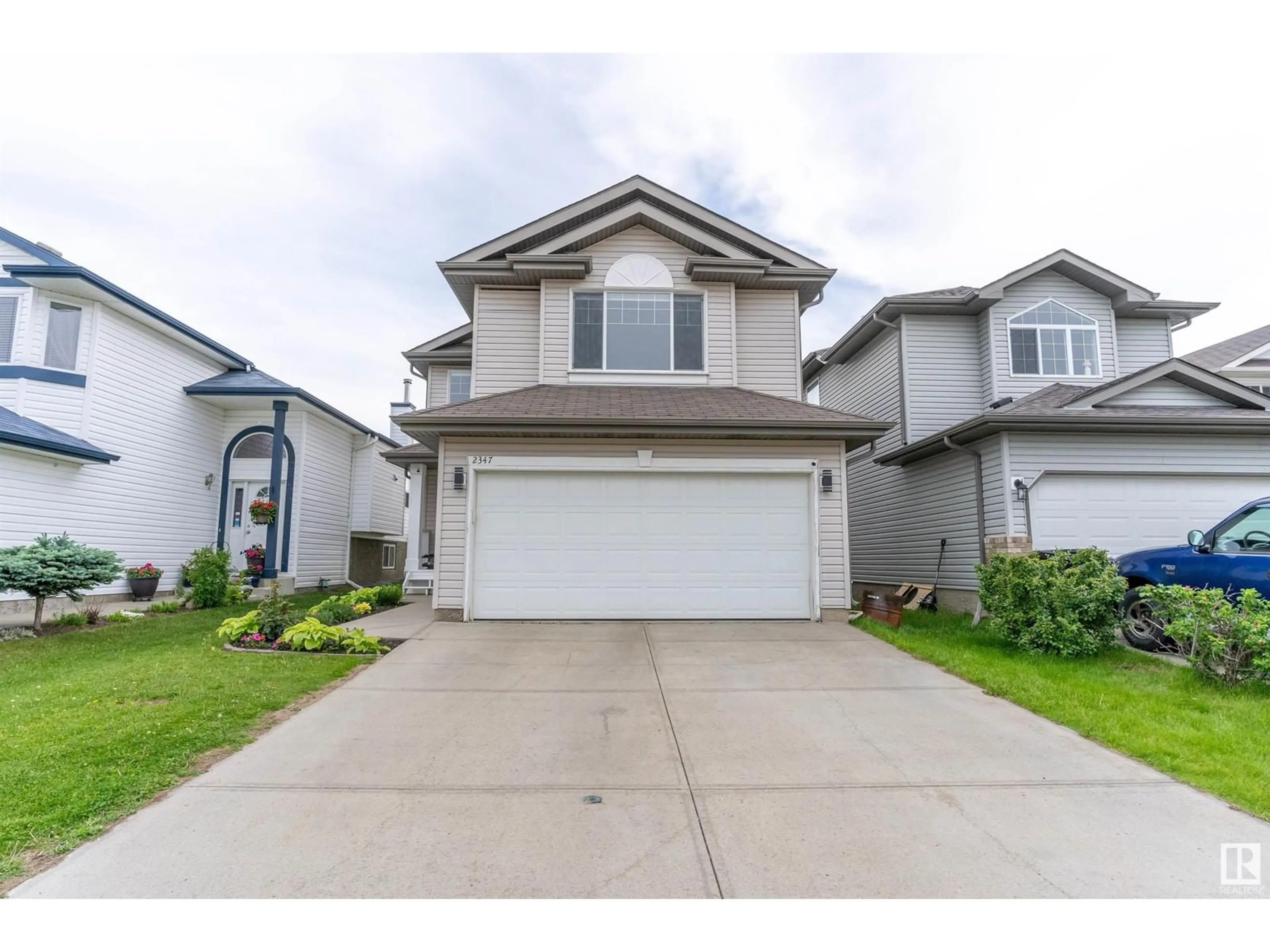 Frontside or backside of a home for 2347 32 AV NW, Edmonton Alberta T6T1Z7