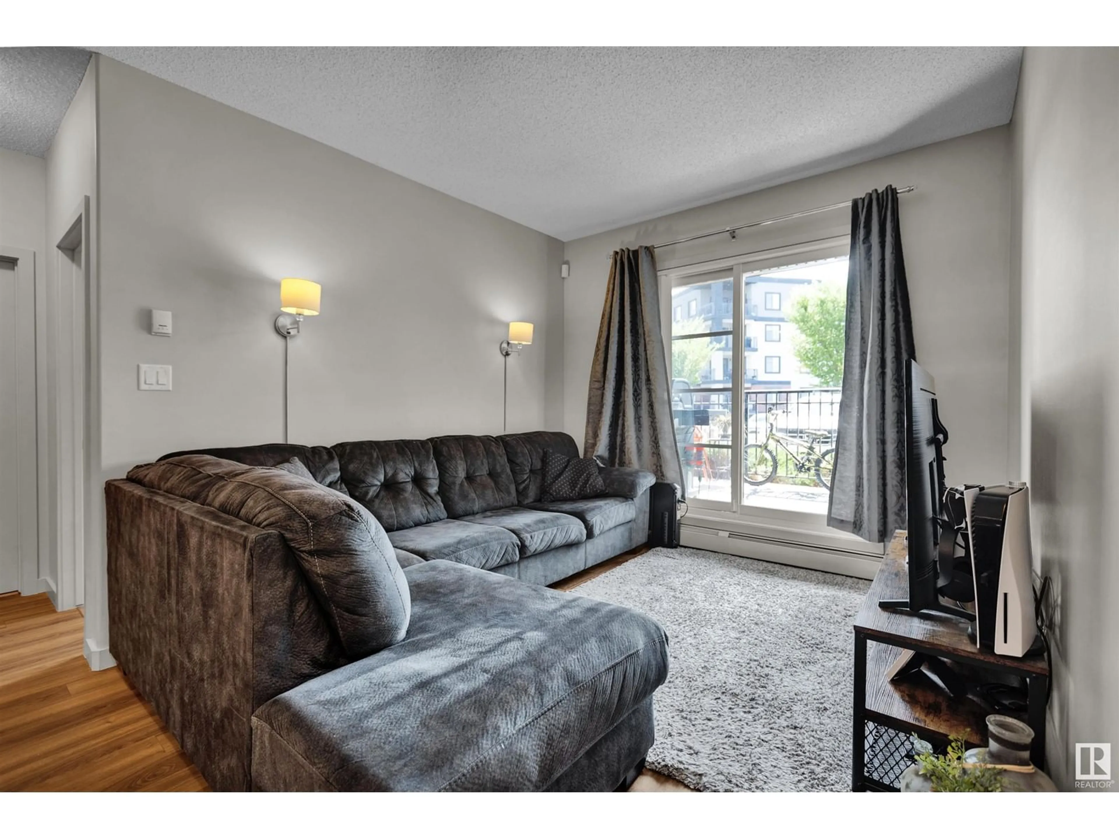 Living room for #118 1144 ADAMSON DR SW, Edmonton Alberta T6W2X7