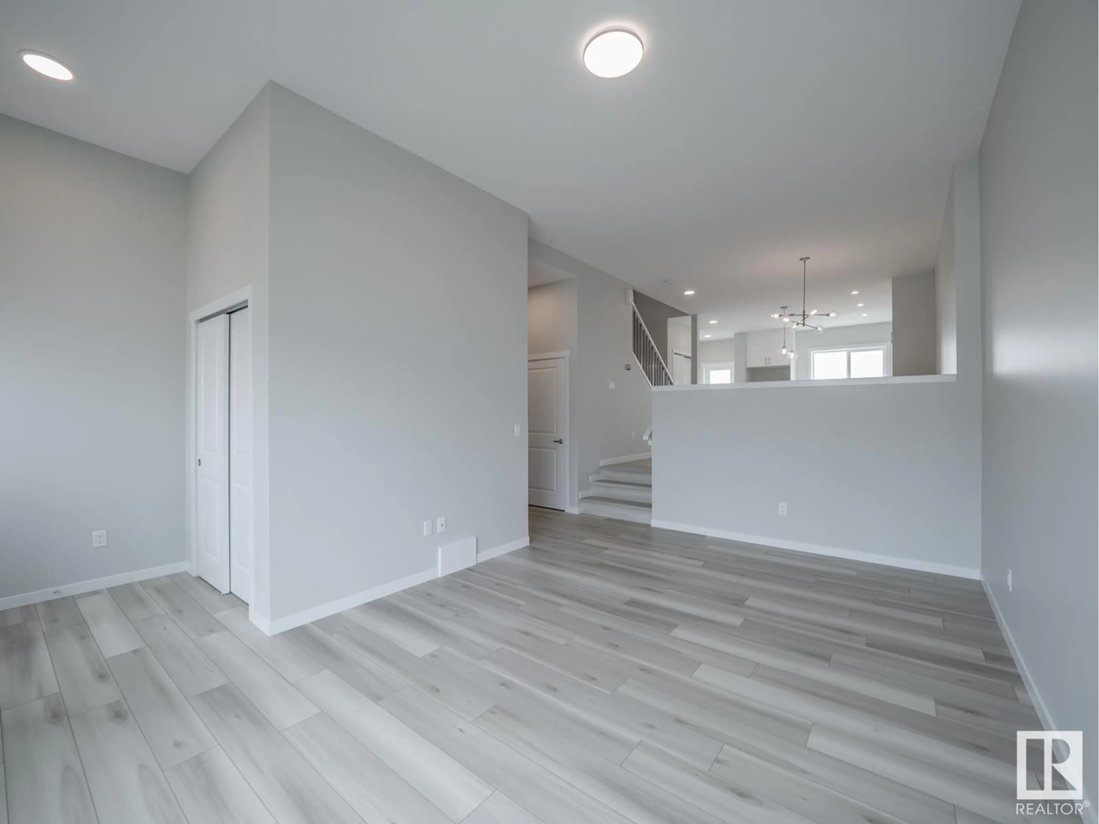 A pic of a room, wood floors for 628 174 AV NE, Edmonton Alberta T5Y4E9