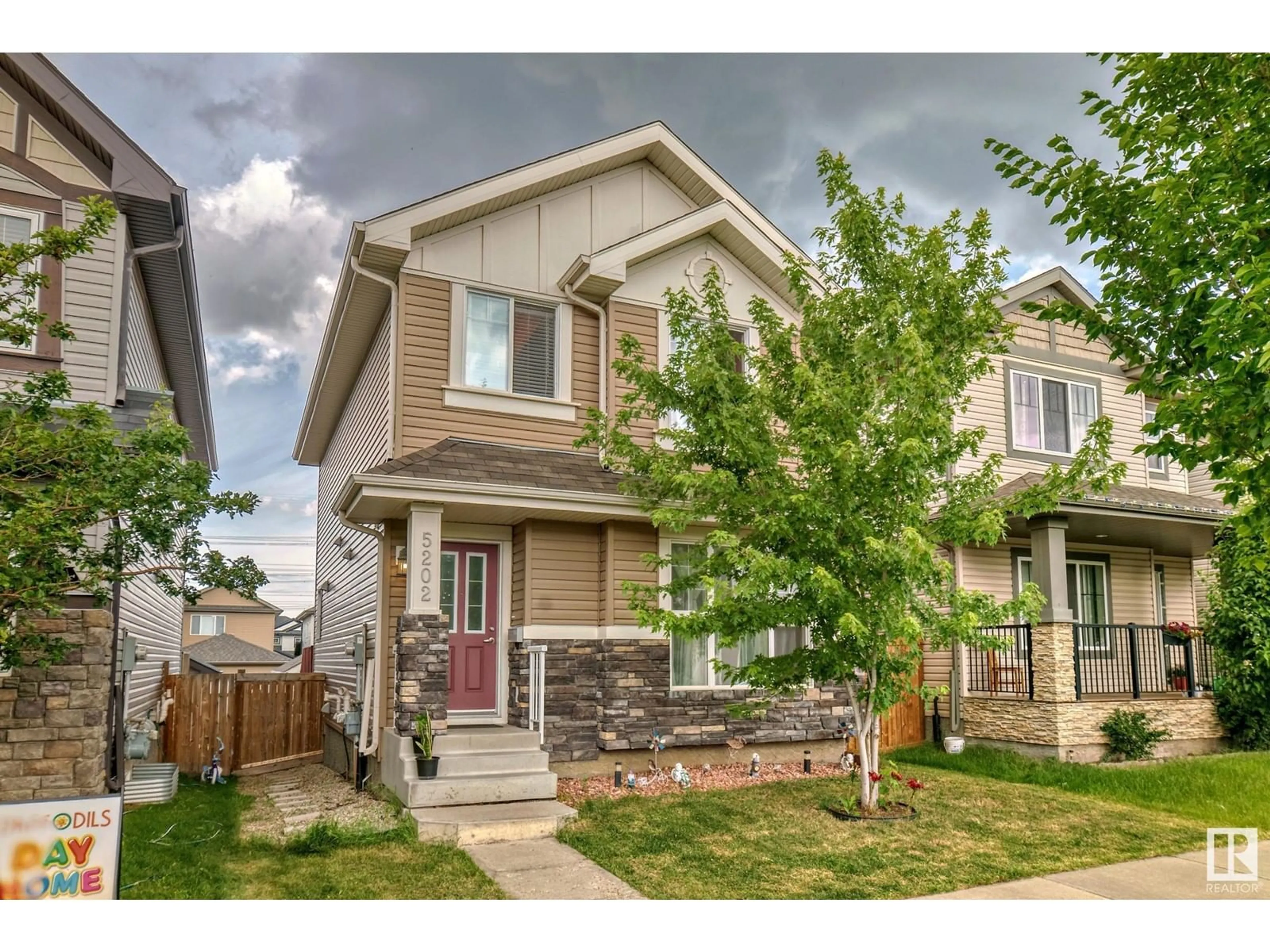 Frontside or backside of a home for 5202 1B AV SW SW, Edmonton Alberta T6X0Z6