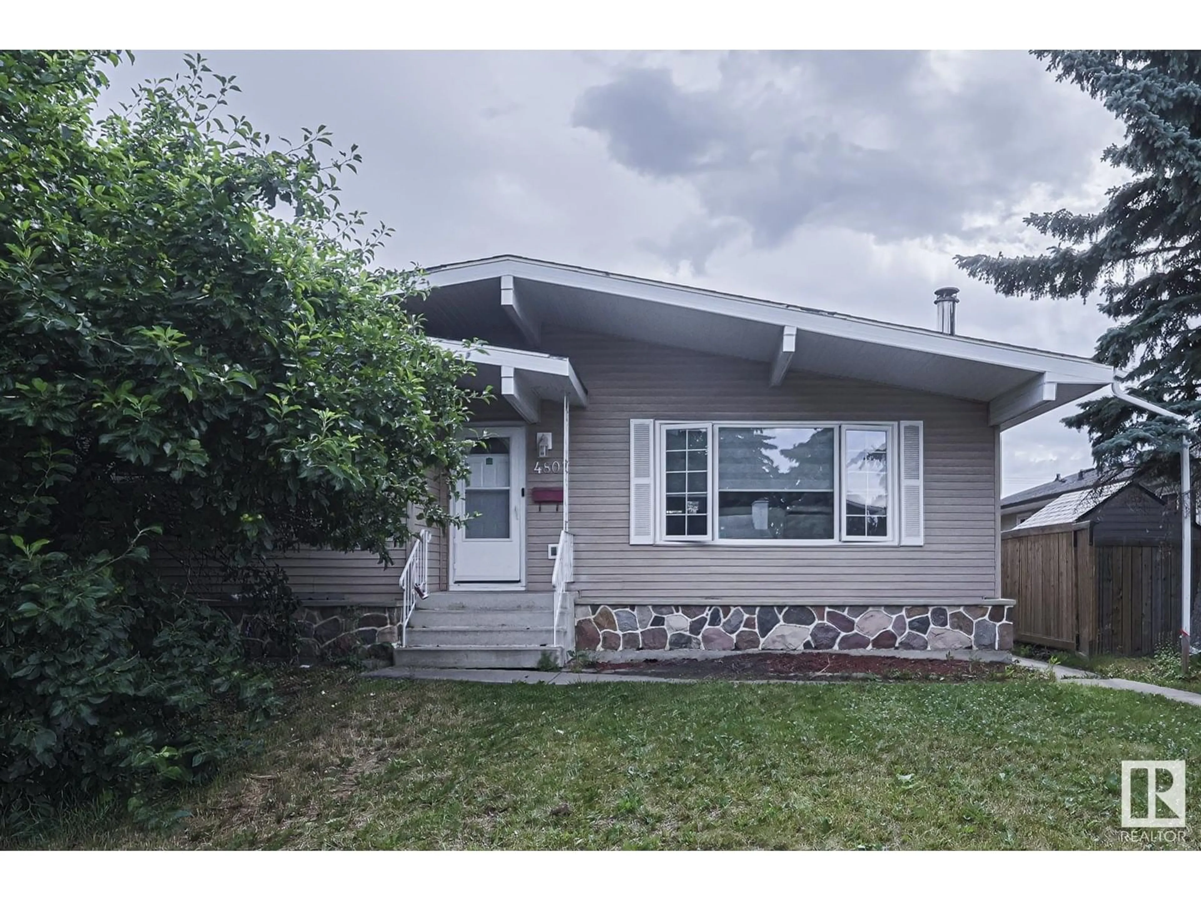 Frontside or backside of a home for 4807 122A ST NW, Edmonton Alberta T6H3S8