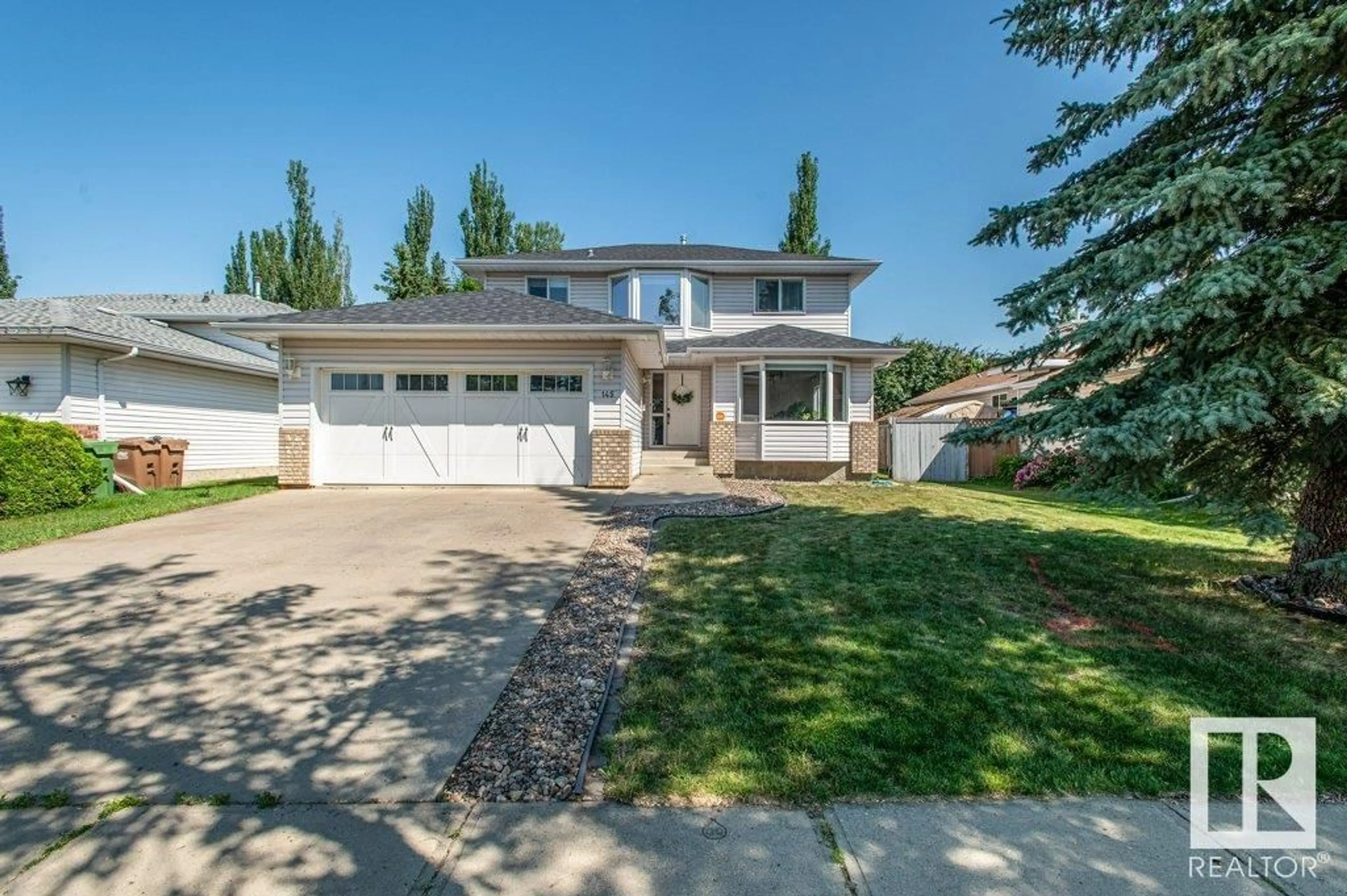 Frontside or backside of a home for 145 HERITAGE DR, St. Albert Alberta T8N6B3