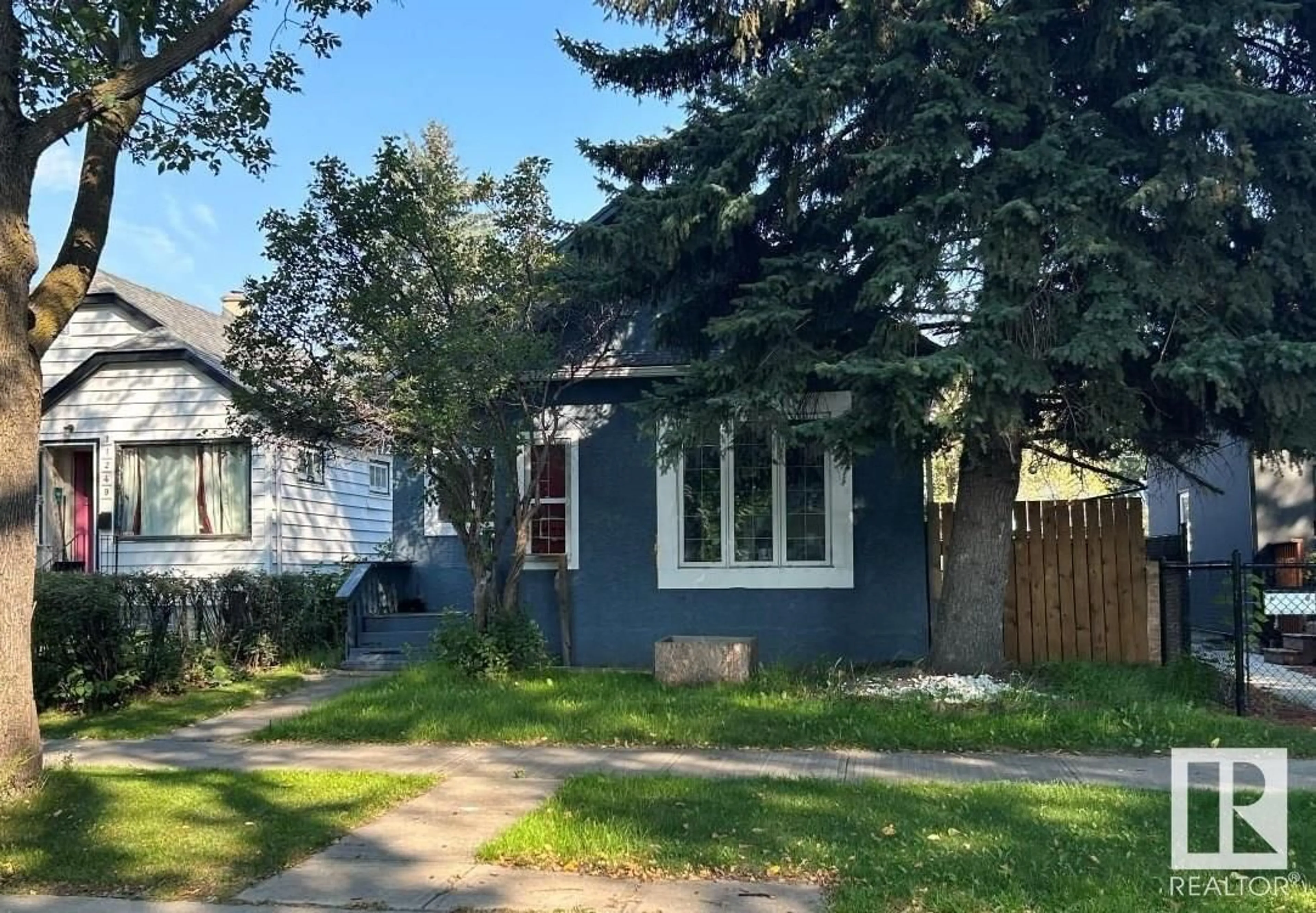 Frontside or backside of a home for 11245 89 ST NW, Edmonton Alberta T5B3T3