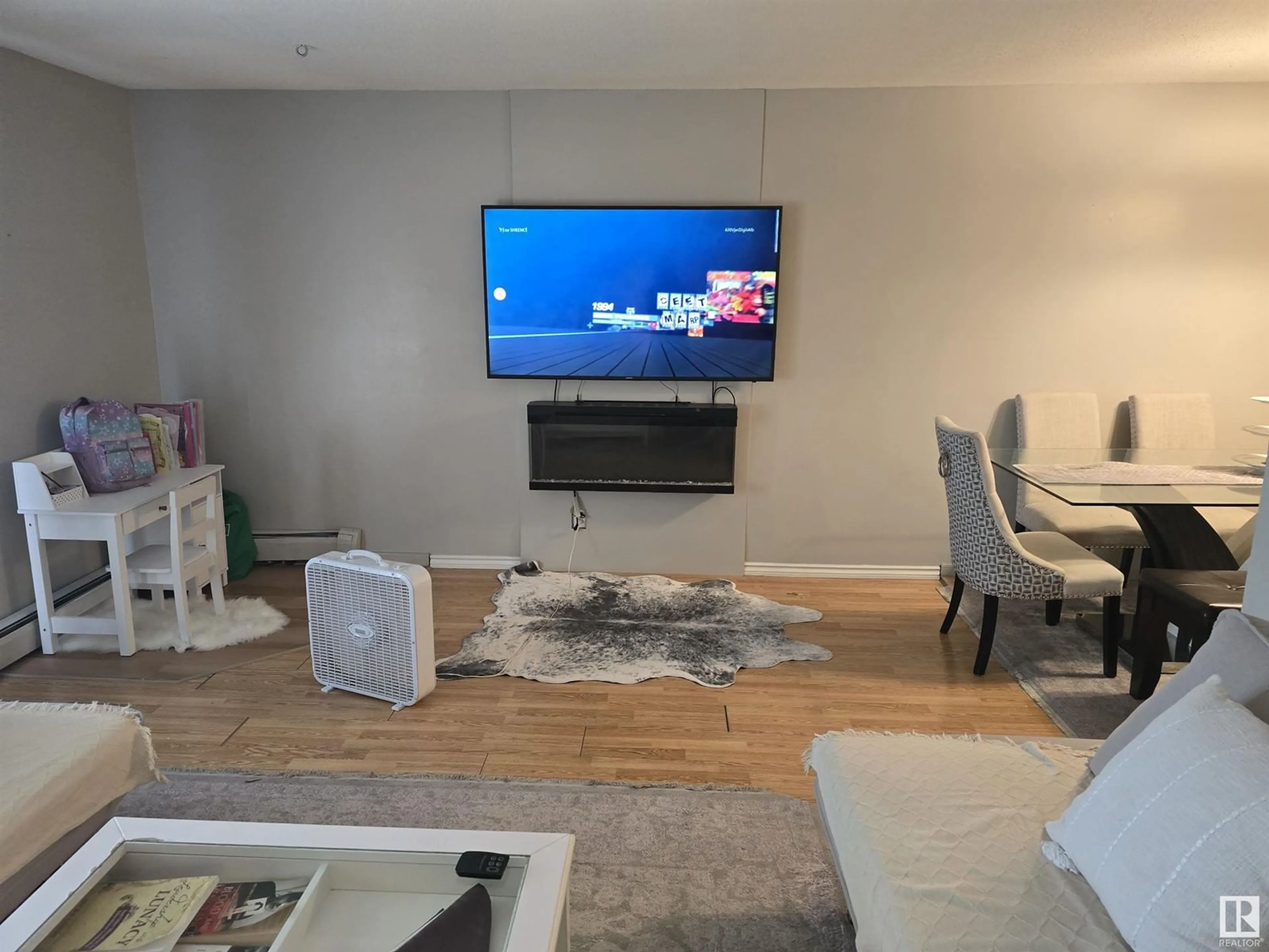 Media room, wood floors for #305 2545 116 ST NW, Edmonton Alberta T6J3Z7