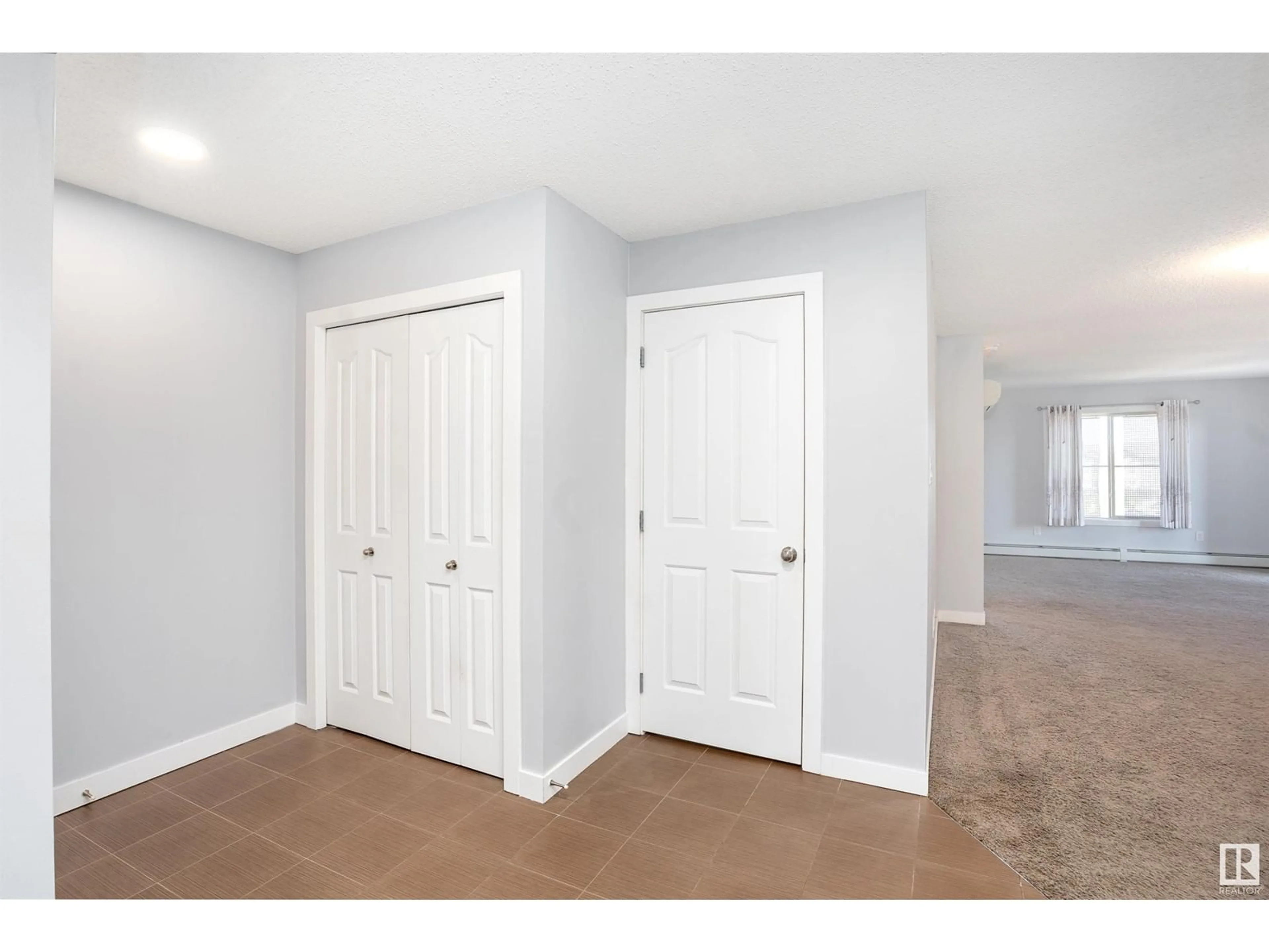 Storage room or clothes room or walk-in closet for #402 270 MCCONACHIE DR NW, Edmonton Alberta T5Y3N4