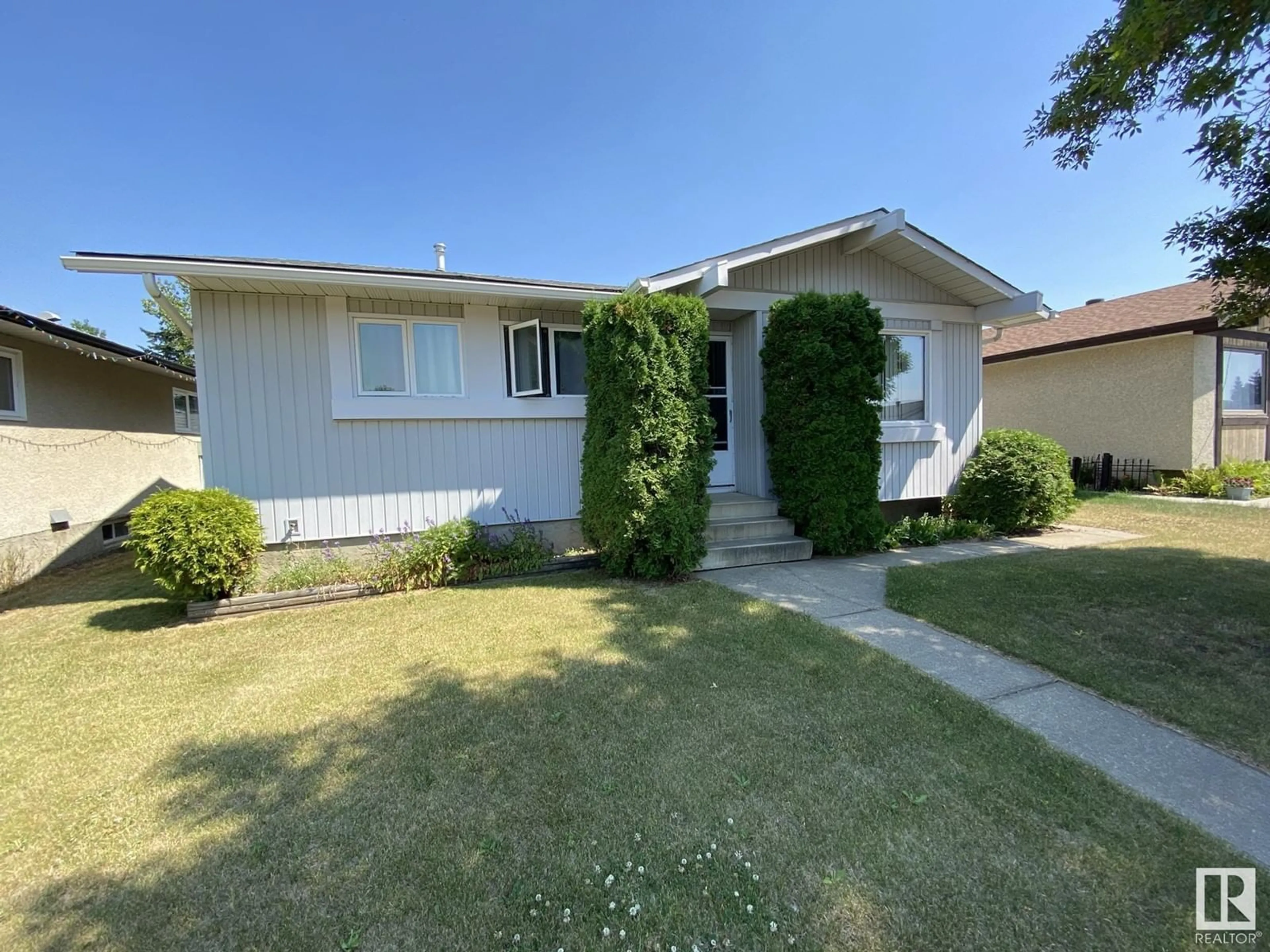 Frontside or backside of a home for 14217 114 ST NW, Edmonton Alberta T5X1R6