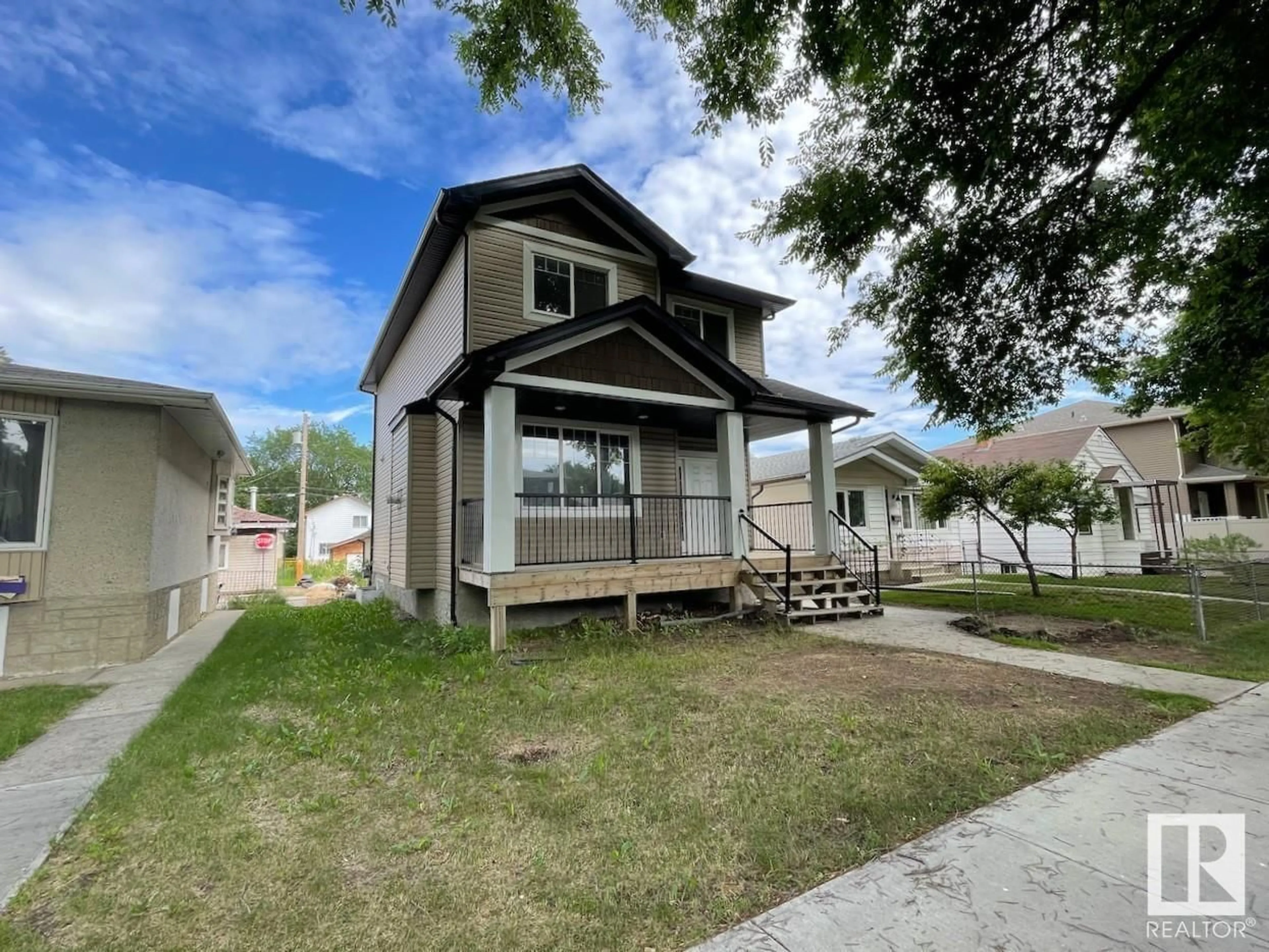 Frontside or backside of a home for 11835 56 ST NW, Edmonton Alberta T5W3S7