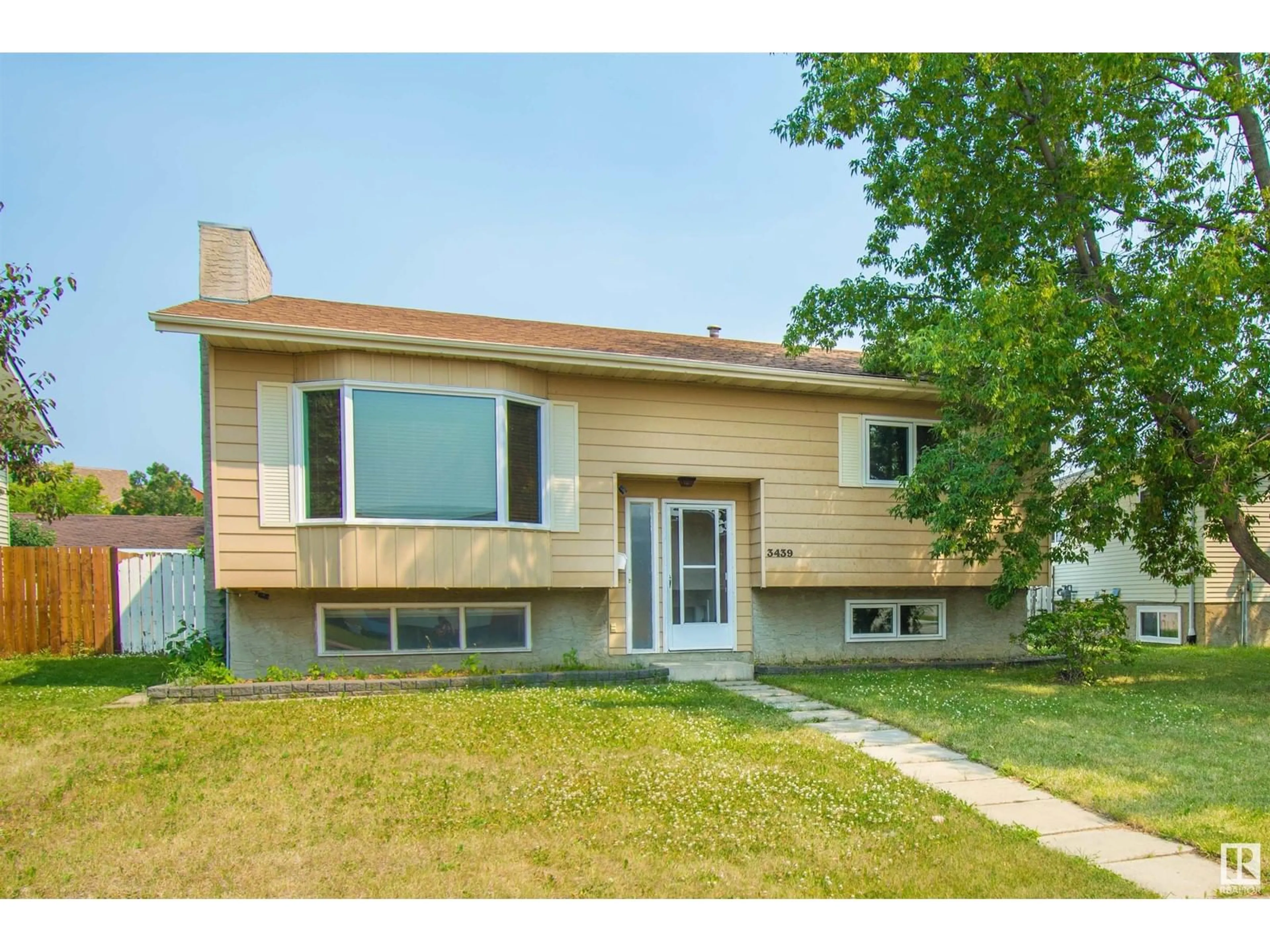Frontside or backside of a home for 3439 37 ST NW, Edmonton Alberta T6L4Z4