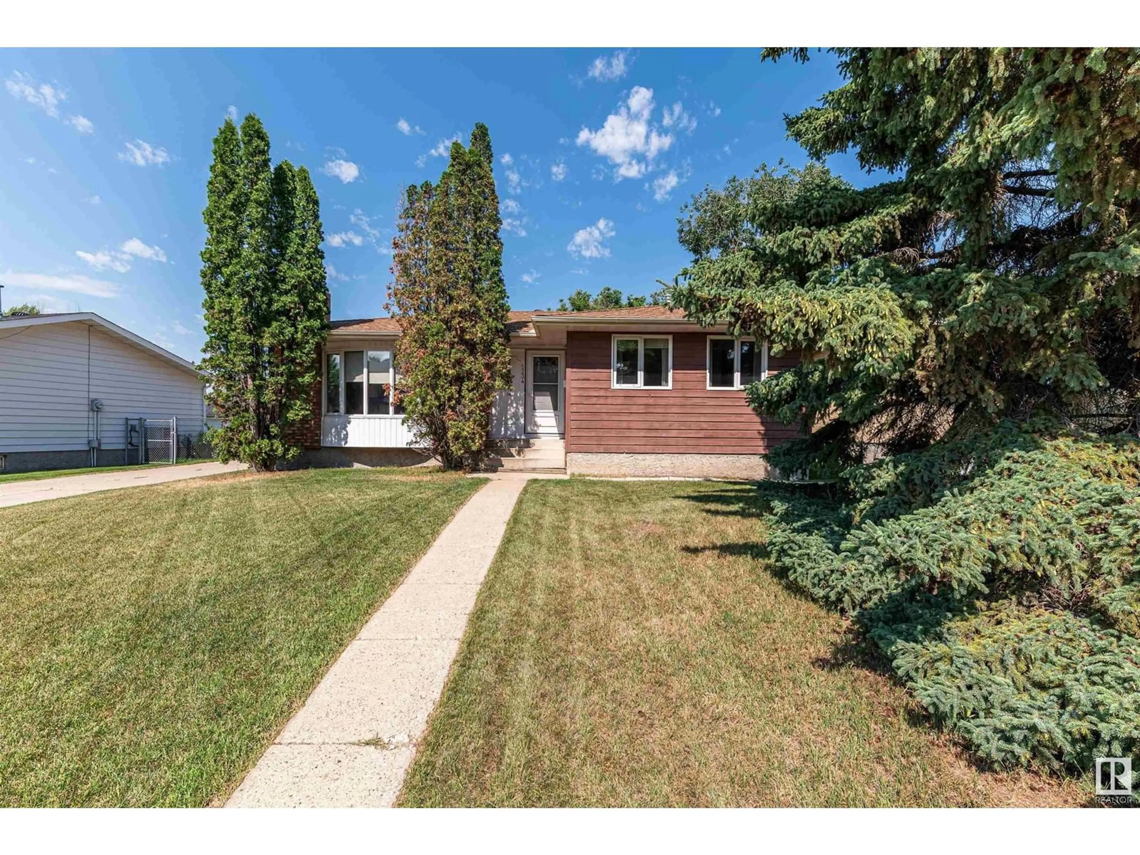 Frontside or backside of a home for 5234 56A ST, Beaumont Alberta T4X1B4