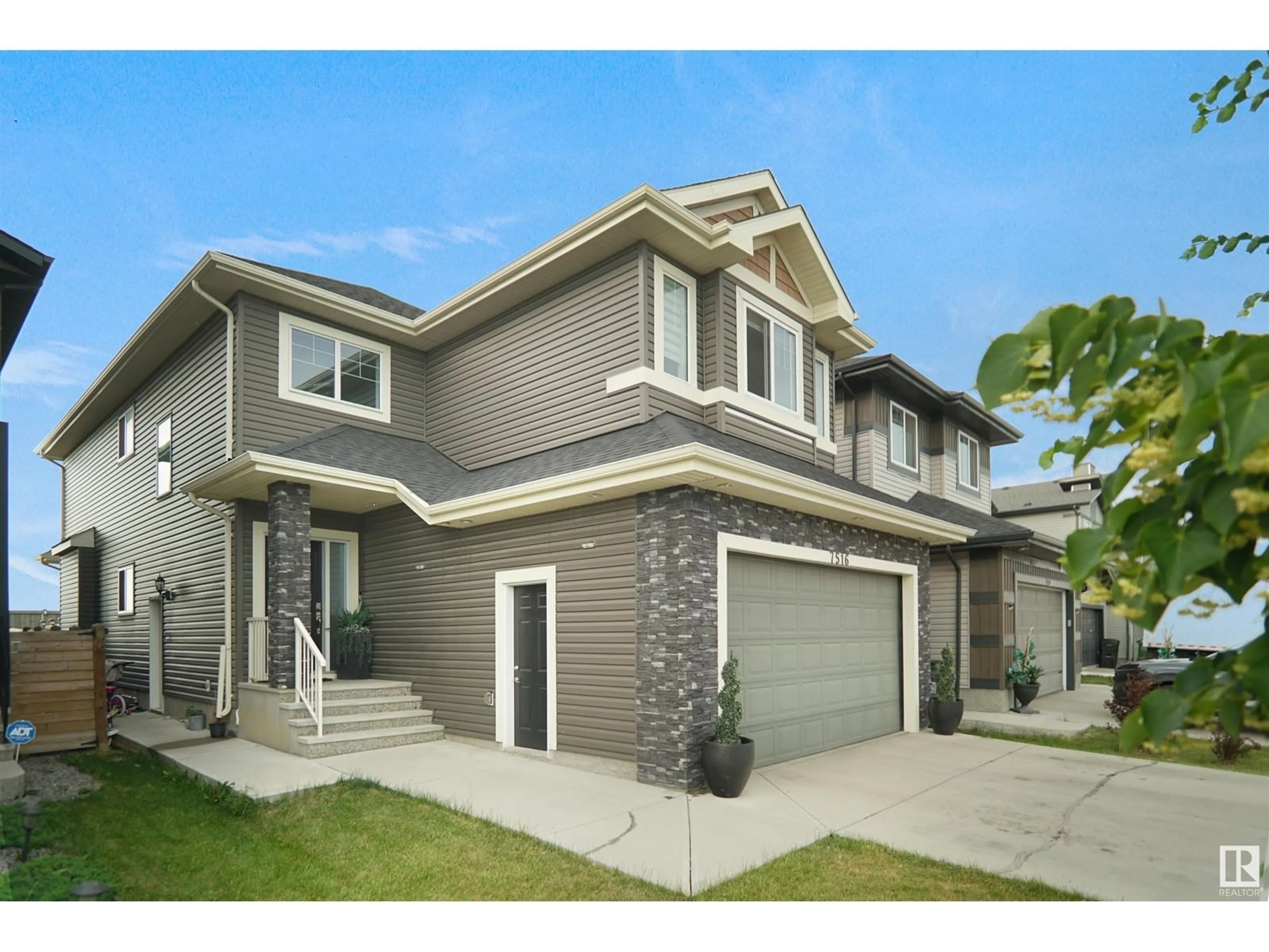 Frontside or backside of a home for 7516 182 AV NW, Edmonton Alberta T5Z0M1