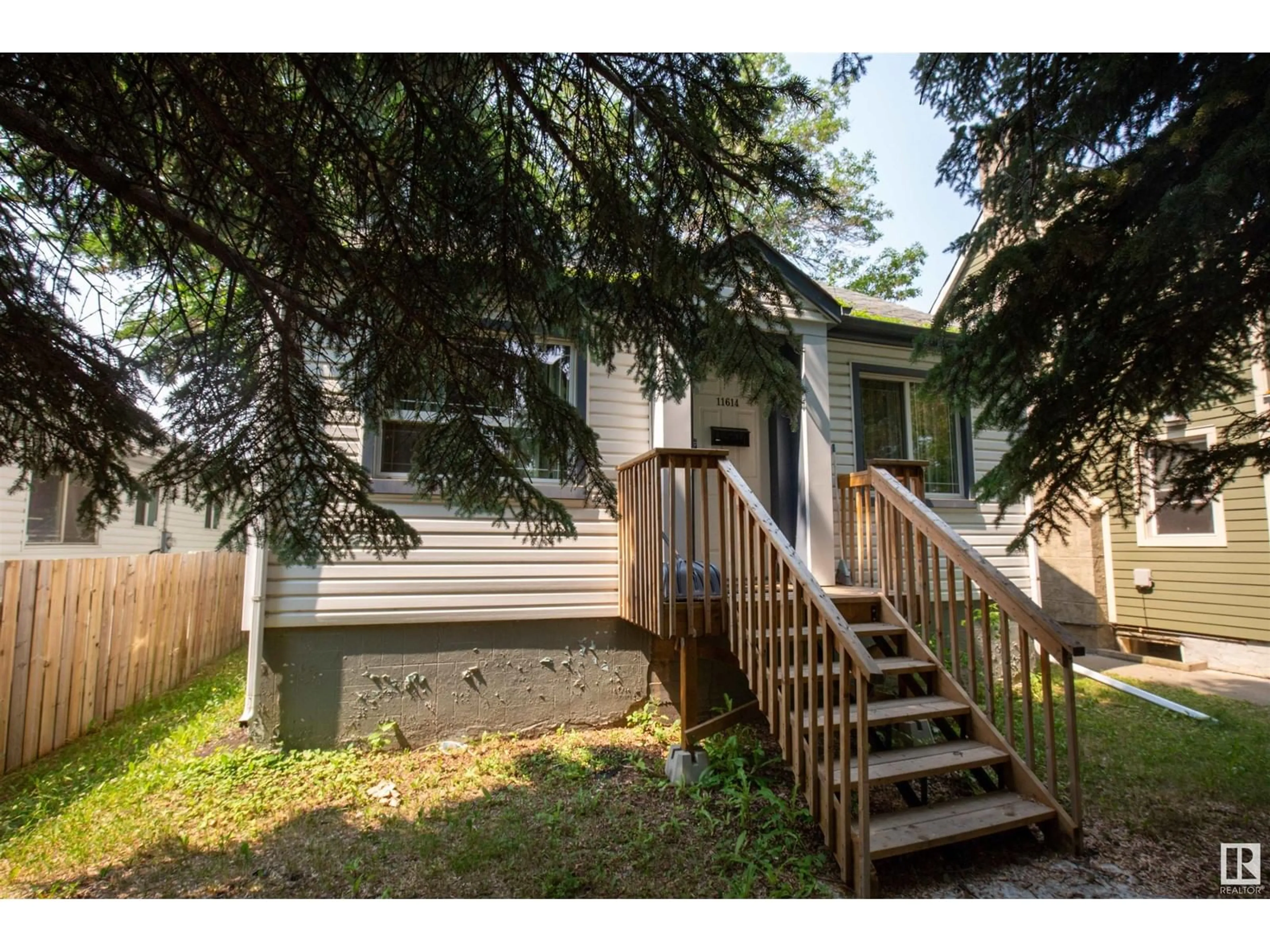 Frontside or backside of a home for 11614 91 ST NW, Edmonton Alberta T5B4B1