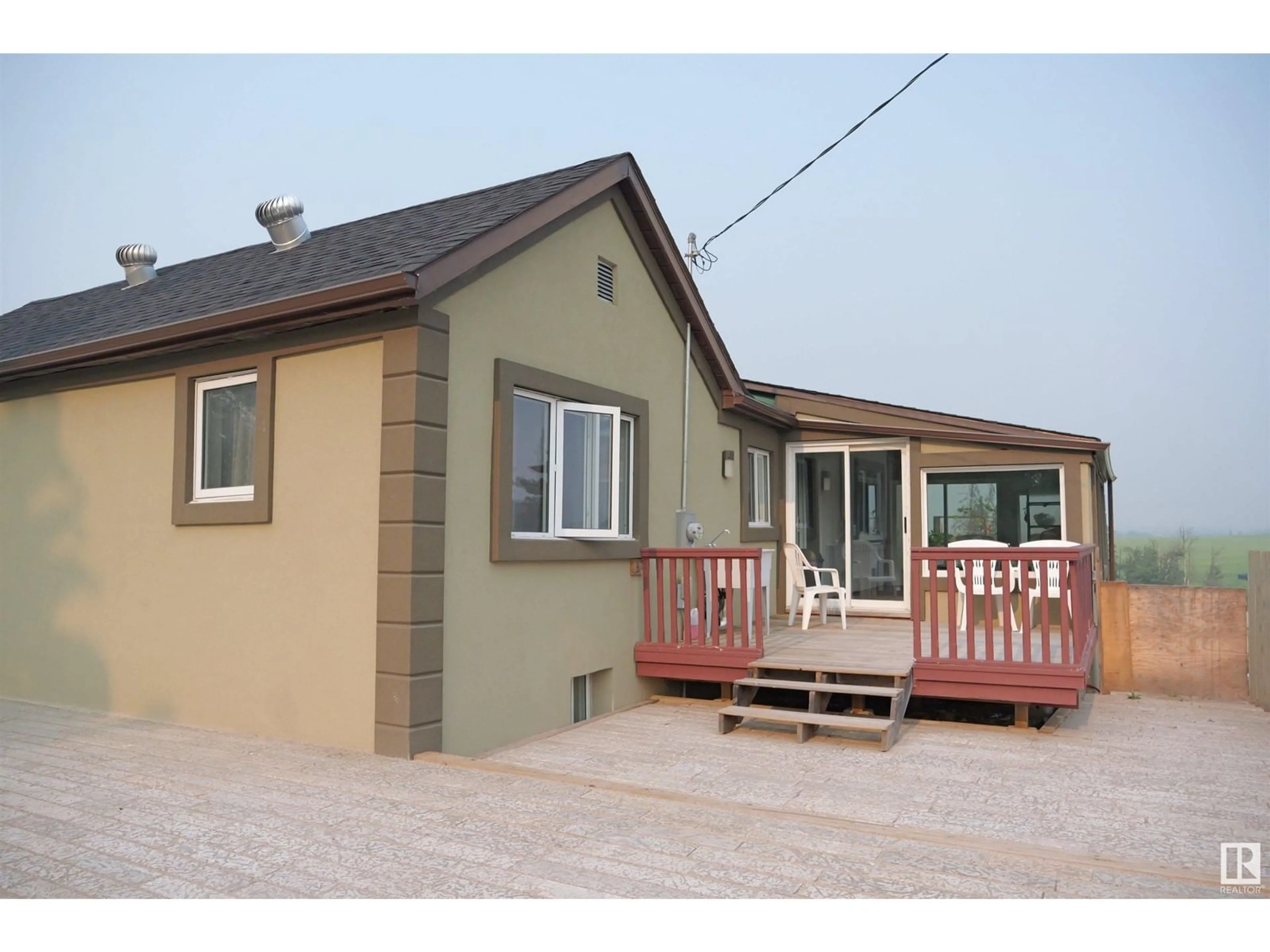 Frontside or backside of a home for 57013 RGE RD 70, Rural Lac Ste. Anne County Alberta T0E2A0