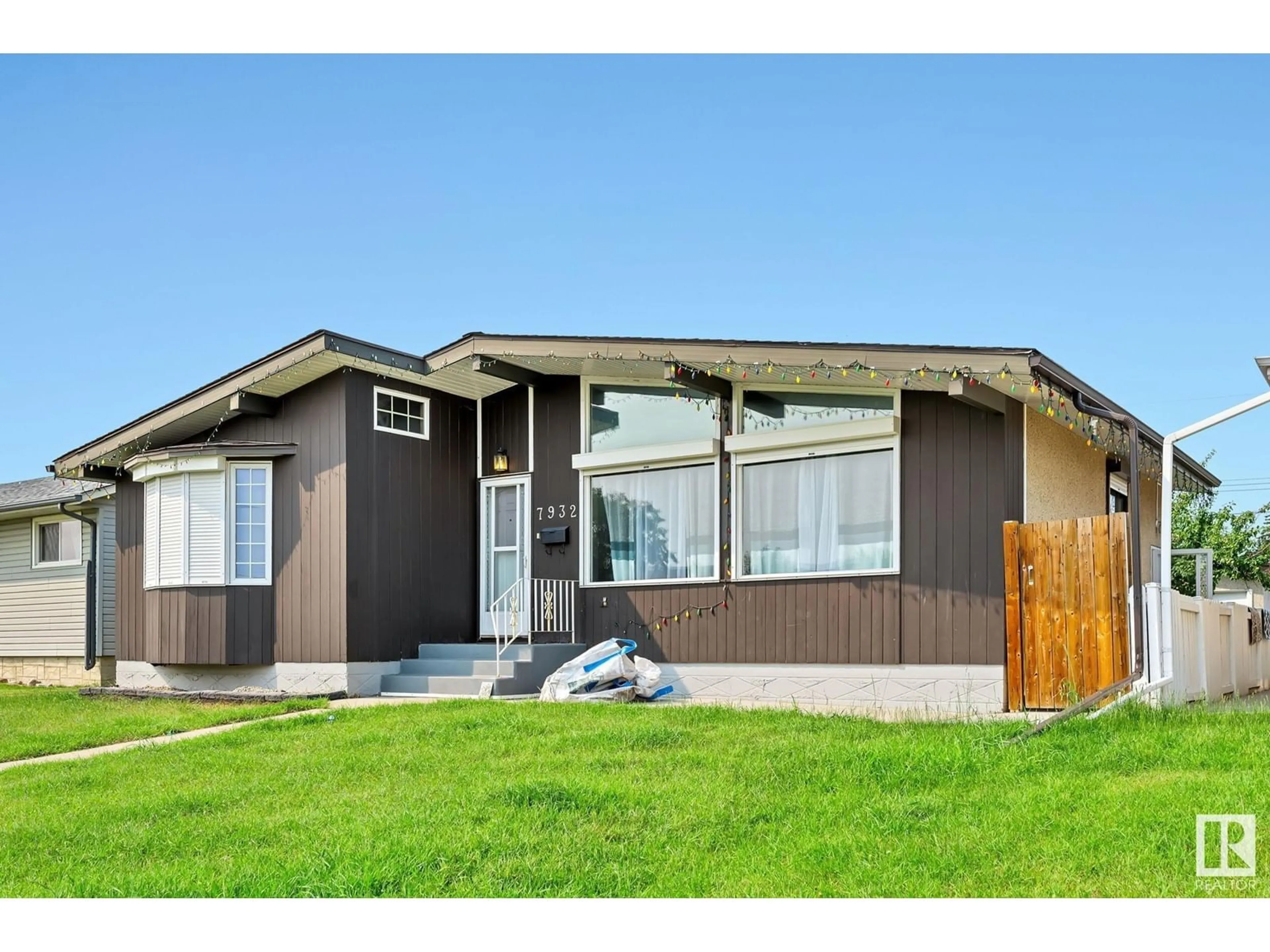 Frontside or backside of a home for 7932 130 AV NW, Edmonton Alberta T5C1Y5