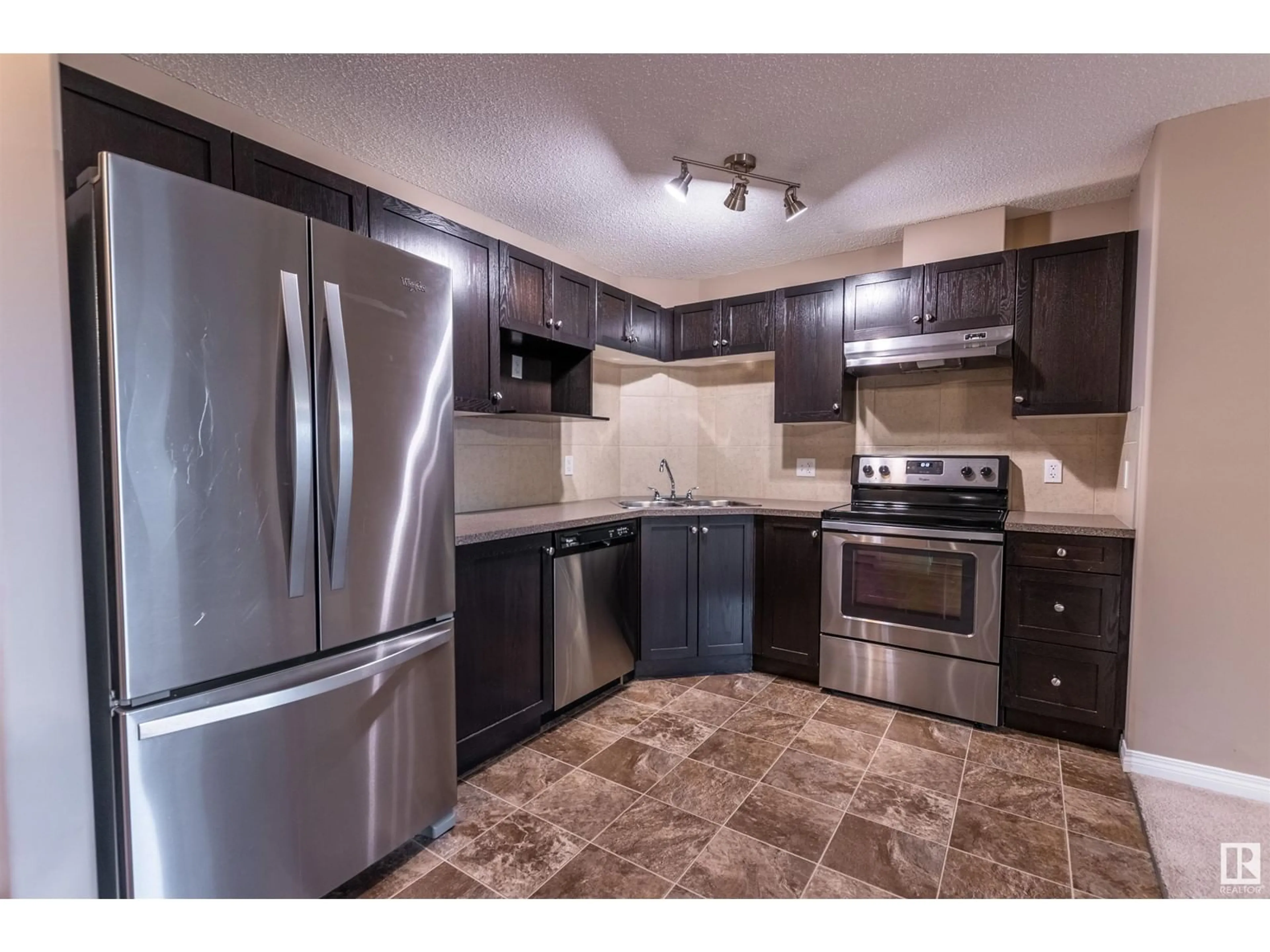 Standard kitchen for #329 1520 HAMMOND GA NW, Edmonton Alberta T6M0J4