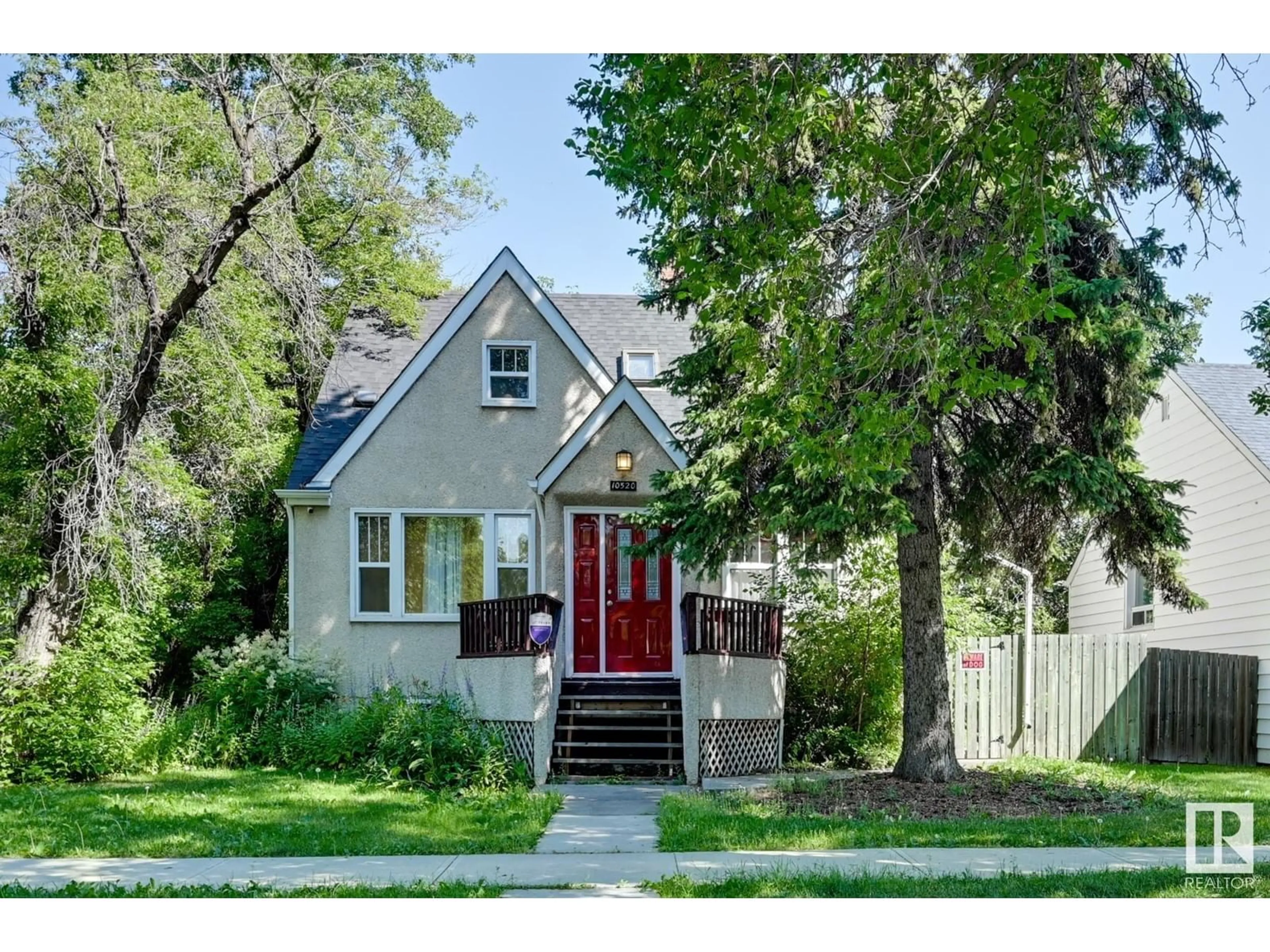 Frontside or backside of a home for 10520 75 AV NW, Edmonton Alberta T6E1J4