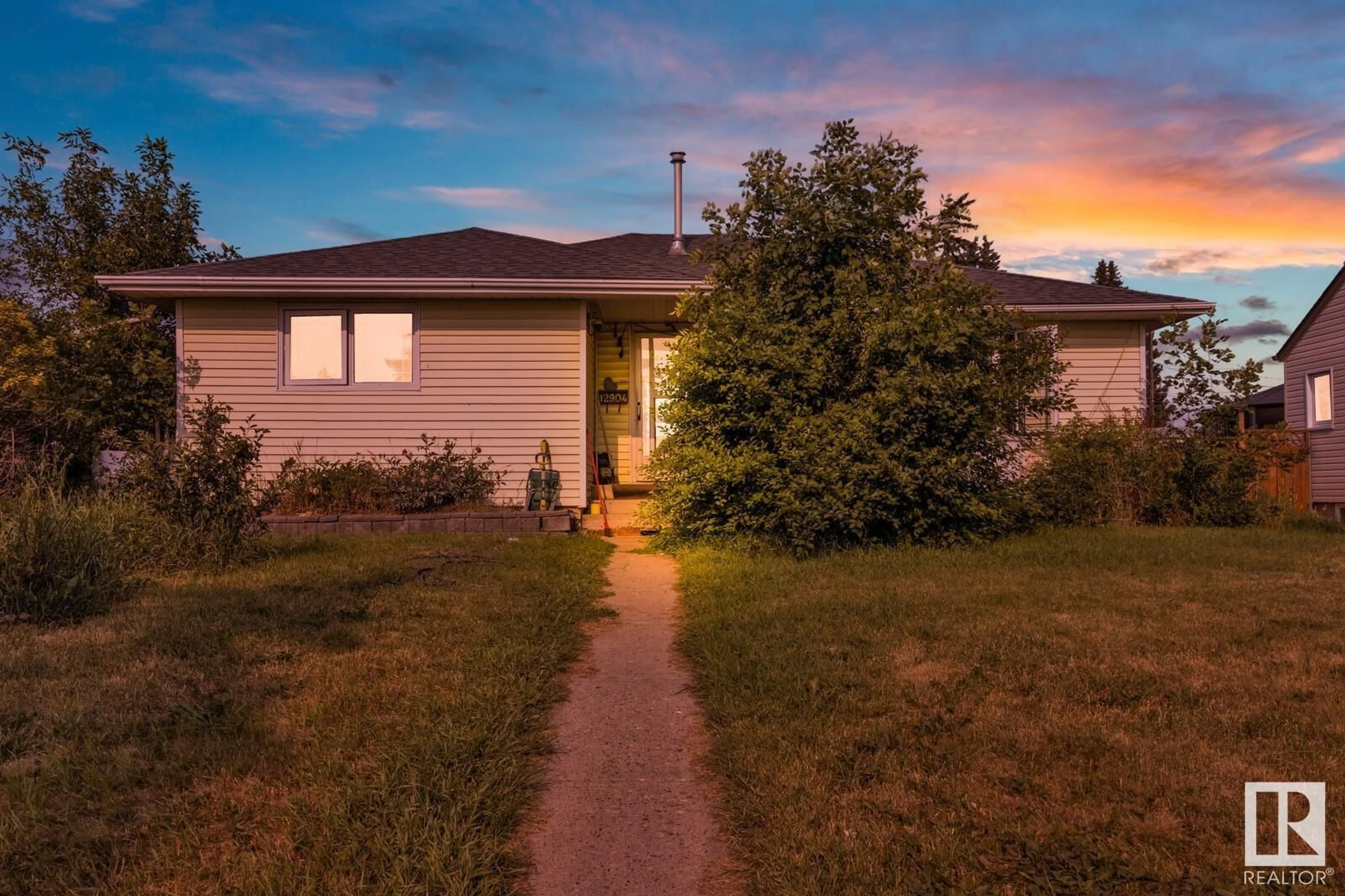 Frontside or backside of a home for 12904 87 ST NW, Edmonton Alberta T5E3E1