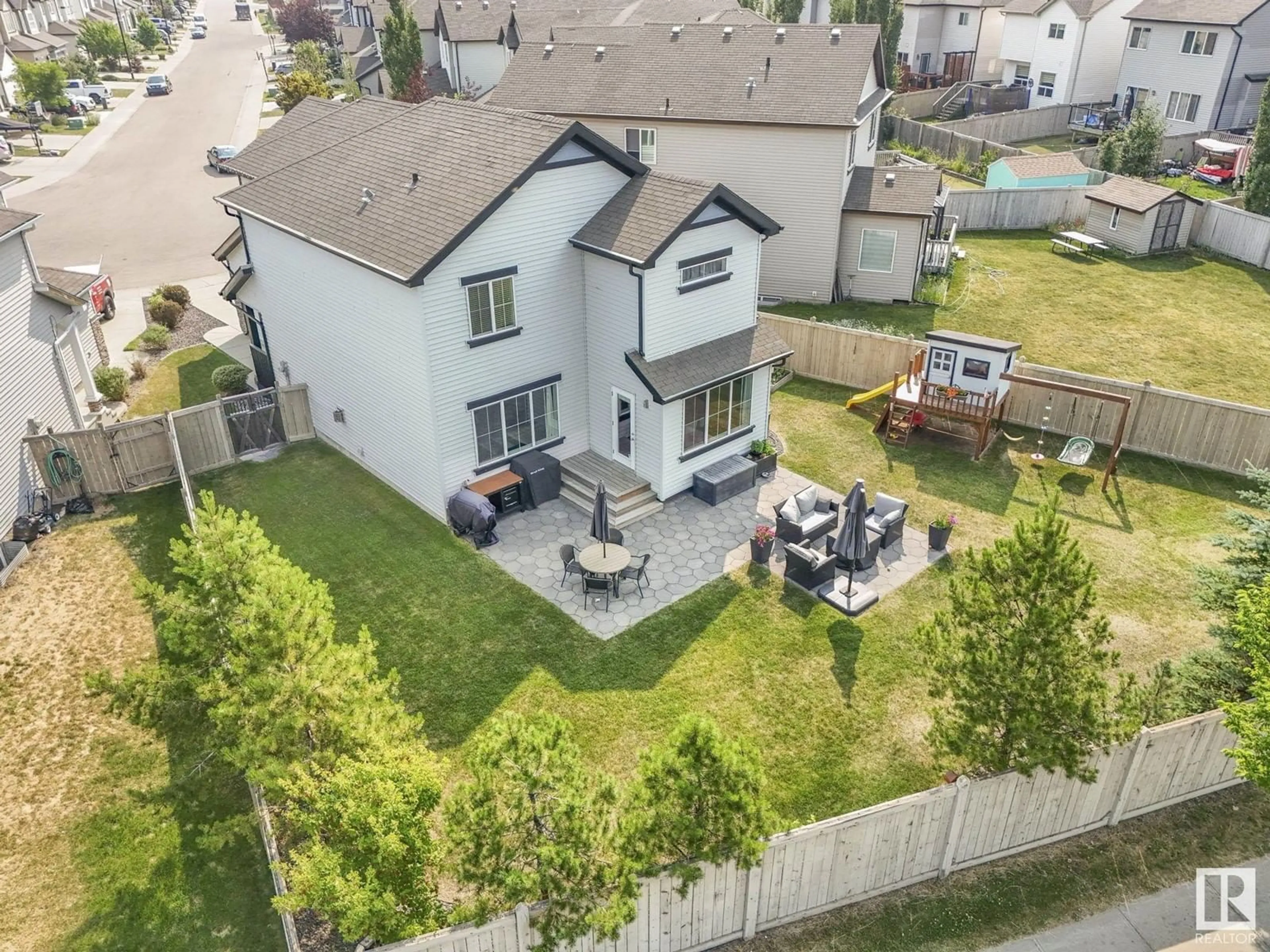 Frontside or backside of a home for 6147 10 AV SW, Edmonton Alberta T6X0M3