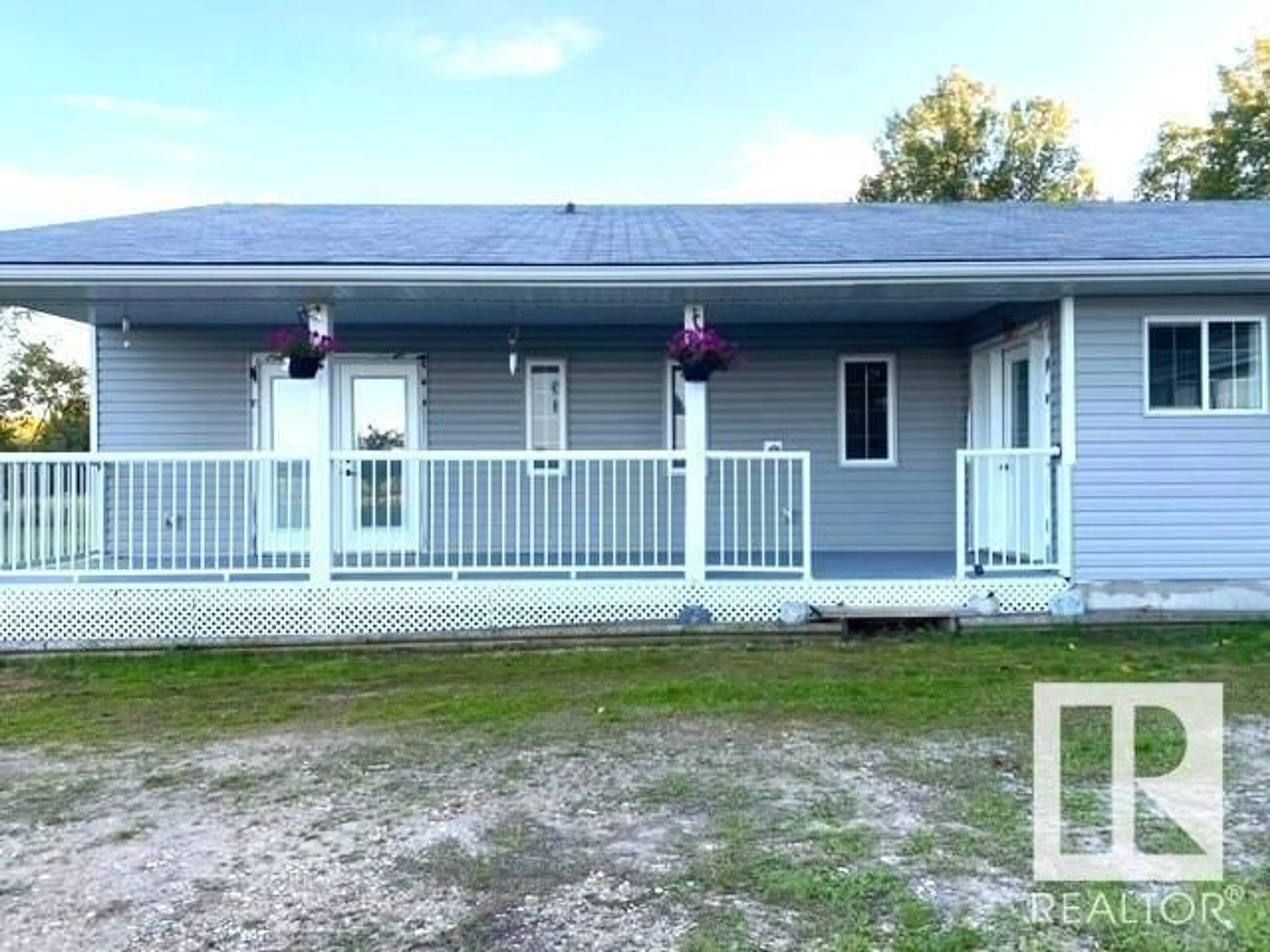 Frontside or backside of a home for 6203 TWP RD 550, Rural Lac Ste. Anne County Alberta T0E0L0