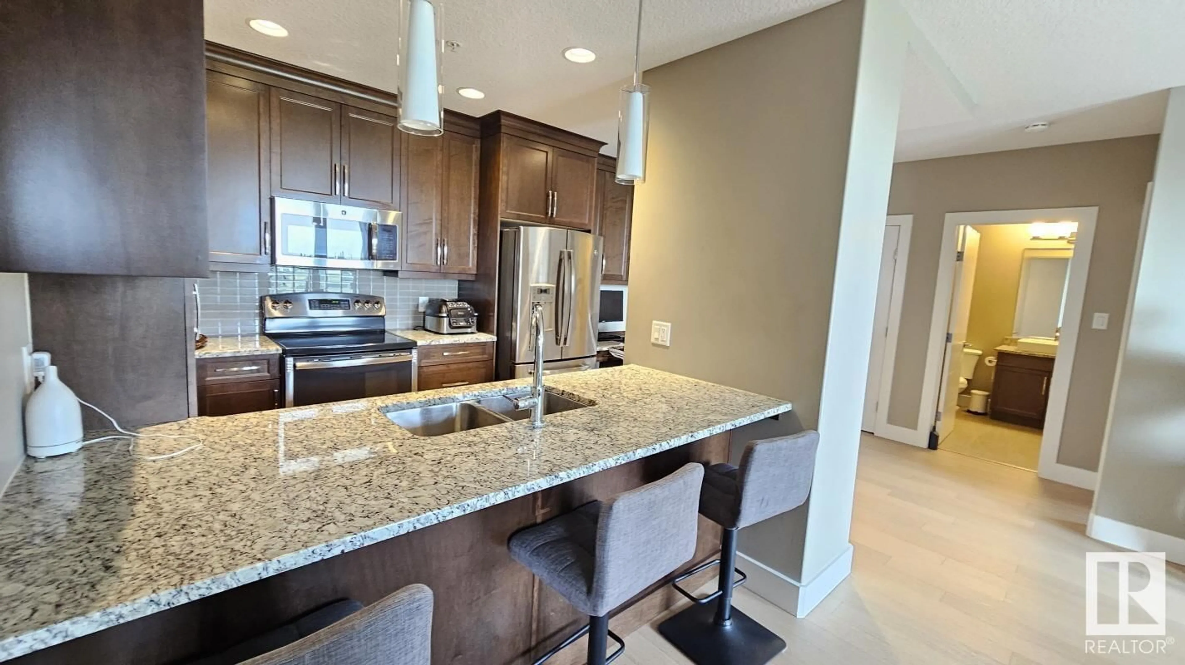 Contemporary kitchen, wood floors for #416 11080 Ellerslie RD SW SW, Edmonton Alberta T6W2C2