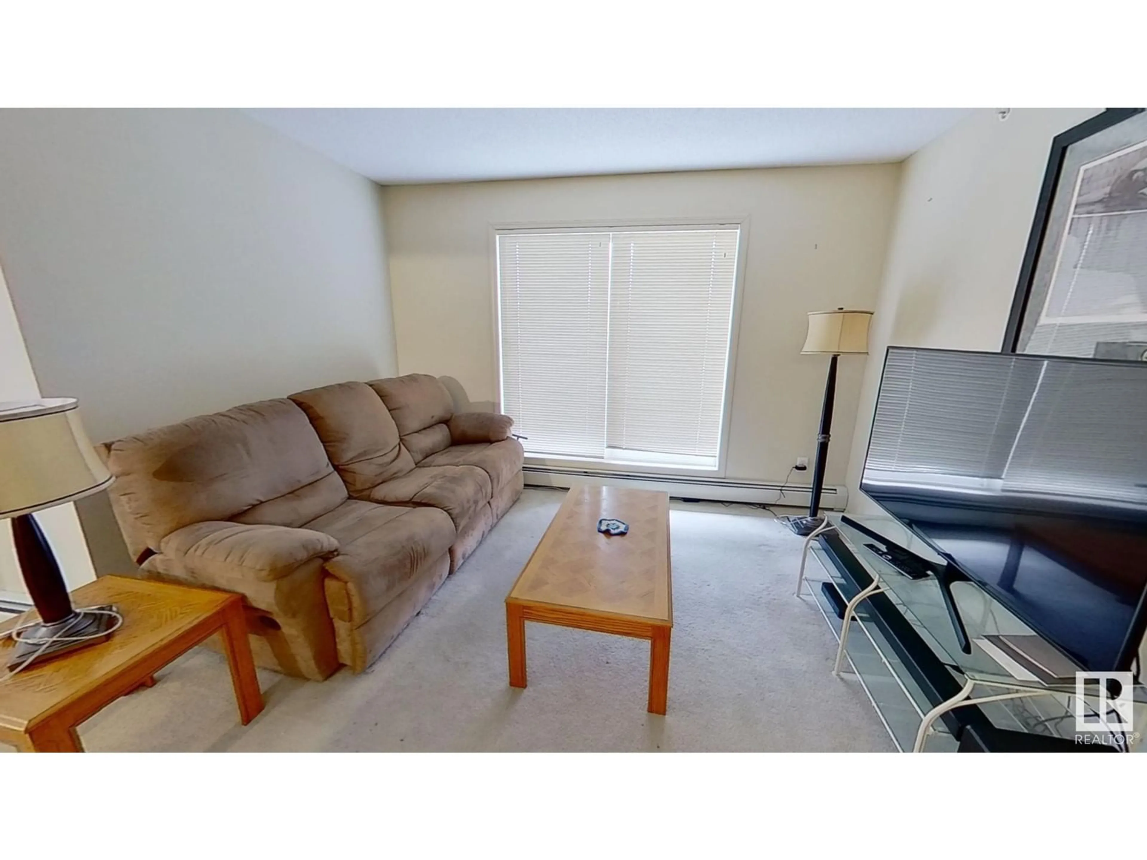 Living room with furniture, unknown for #416 - 1188 HYNDMAN RD, Edmonton Alberta T5A0E9